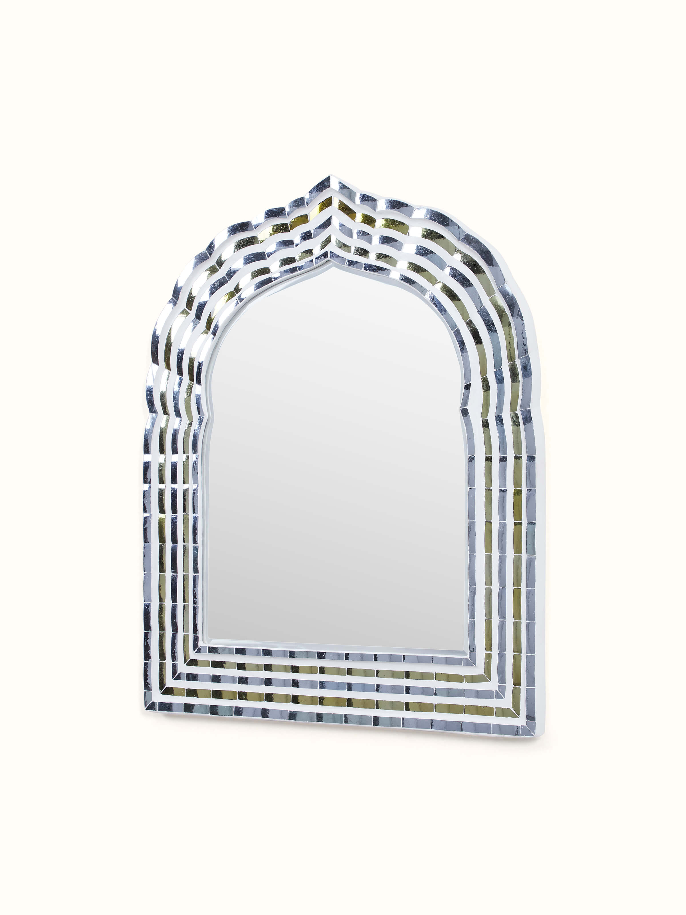 Angled view of Swadesh Glass Floral Inlay Arch Wall Mirror emphasizing the beautiful floral glass inlay and graceful arch shape