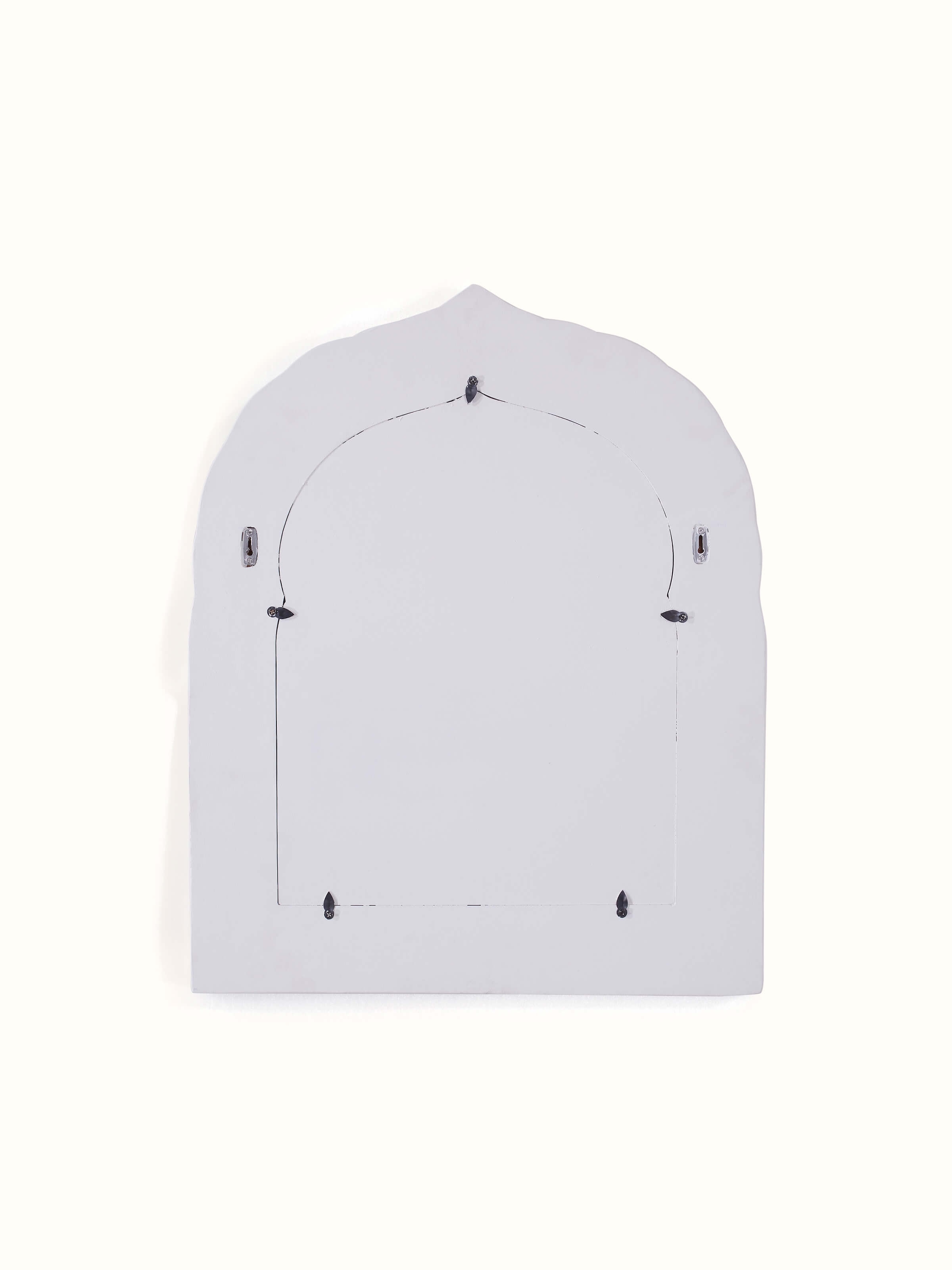 Back view of Swadesh Glass Floral Inlay Arch Wall Mirror showcasing its sleek design and reflective glass surface