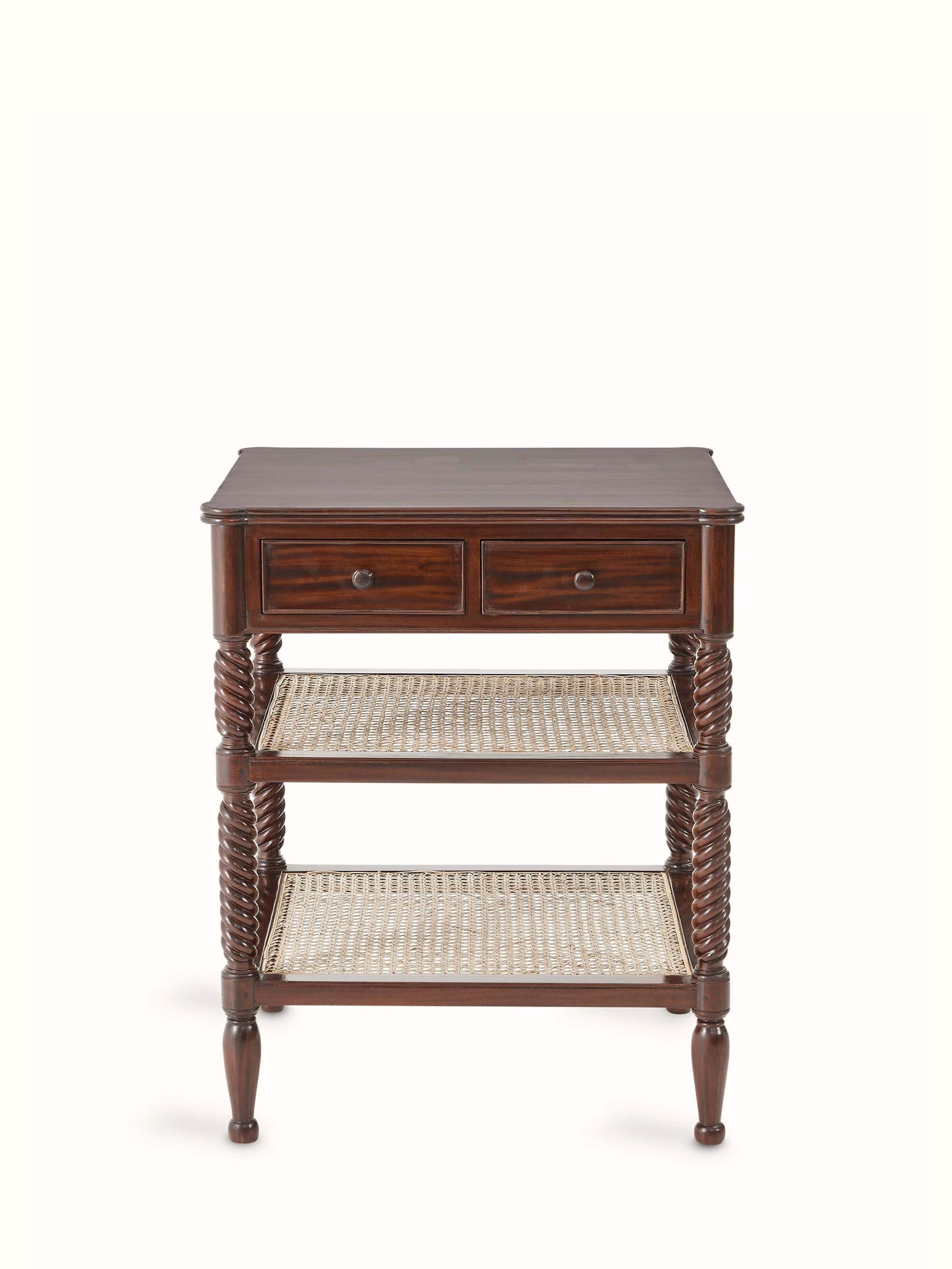 Front view of the mahogany wood and cane bedside table, featuring a sleek design and detailed cane work.