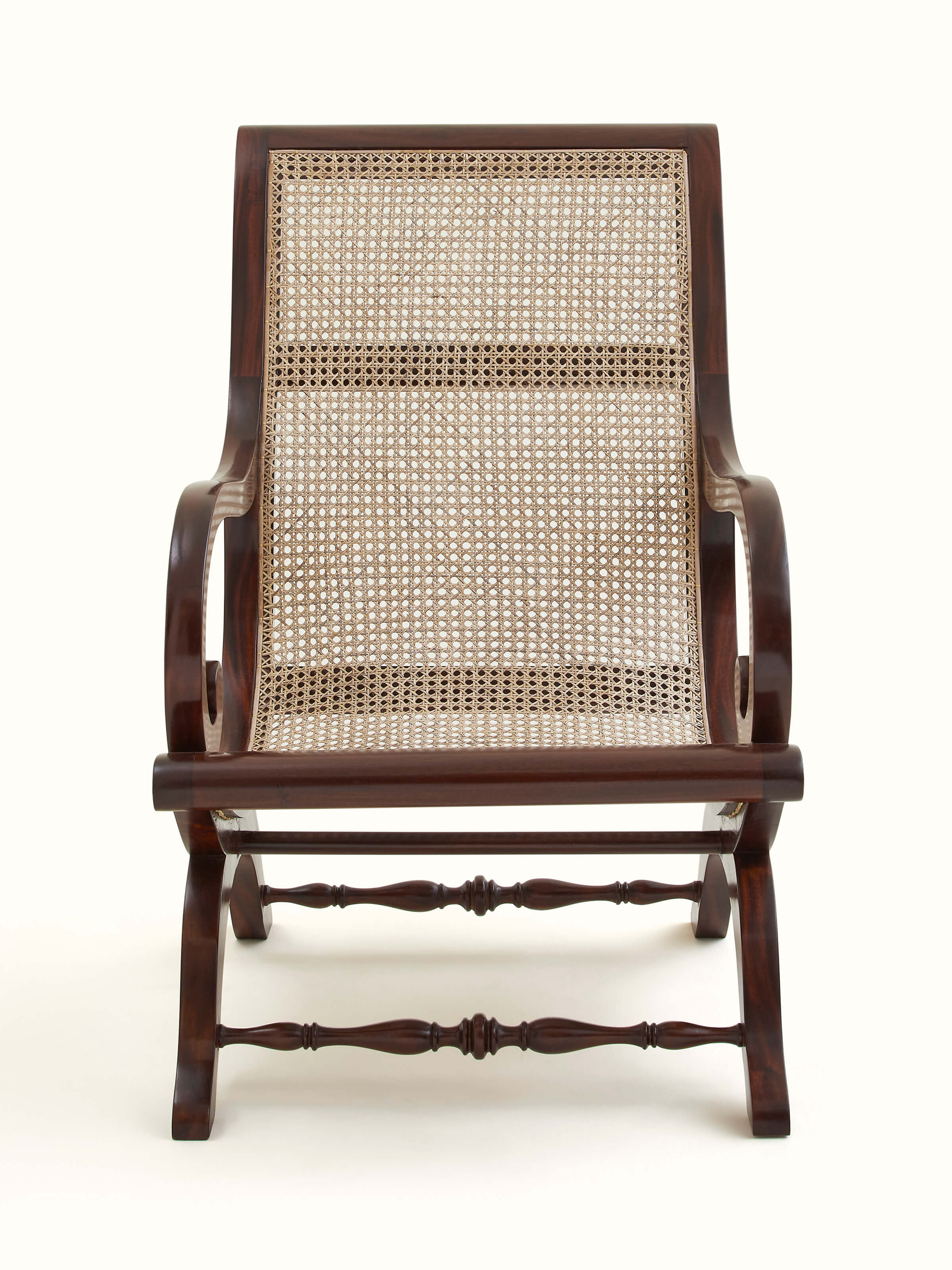 Front view of Mahogany wood & cane wing chair, showcasing the classic design and cane detailing