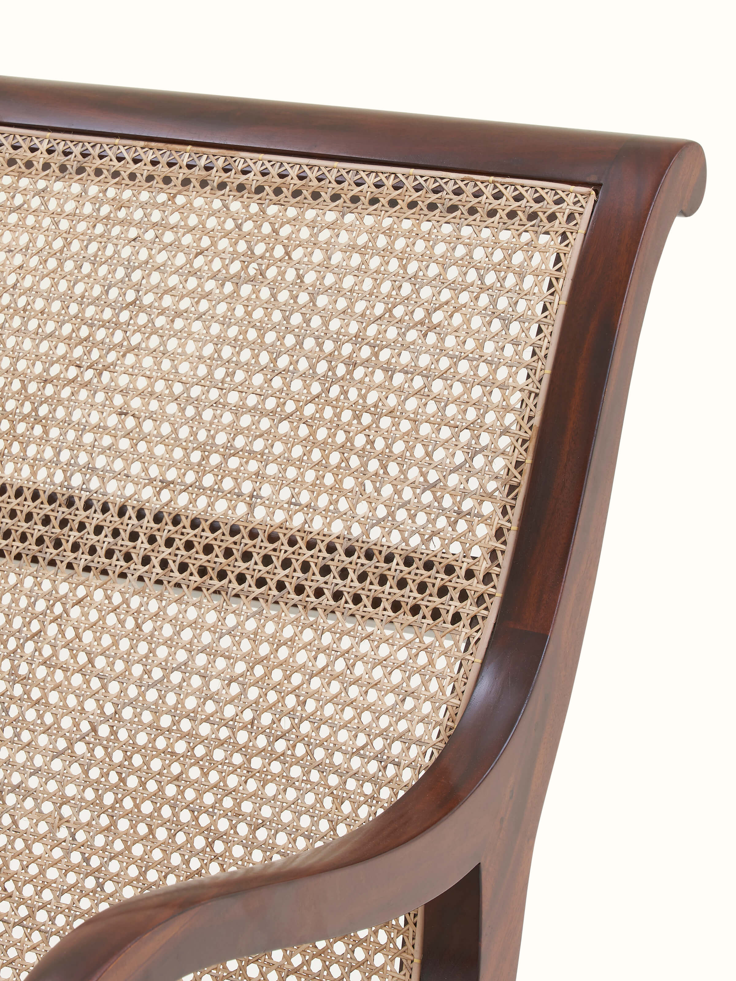 Detailed view of the cane work on the Mahogany wood wing chair, showcasing intricate craftsmanship