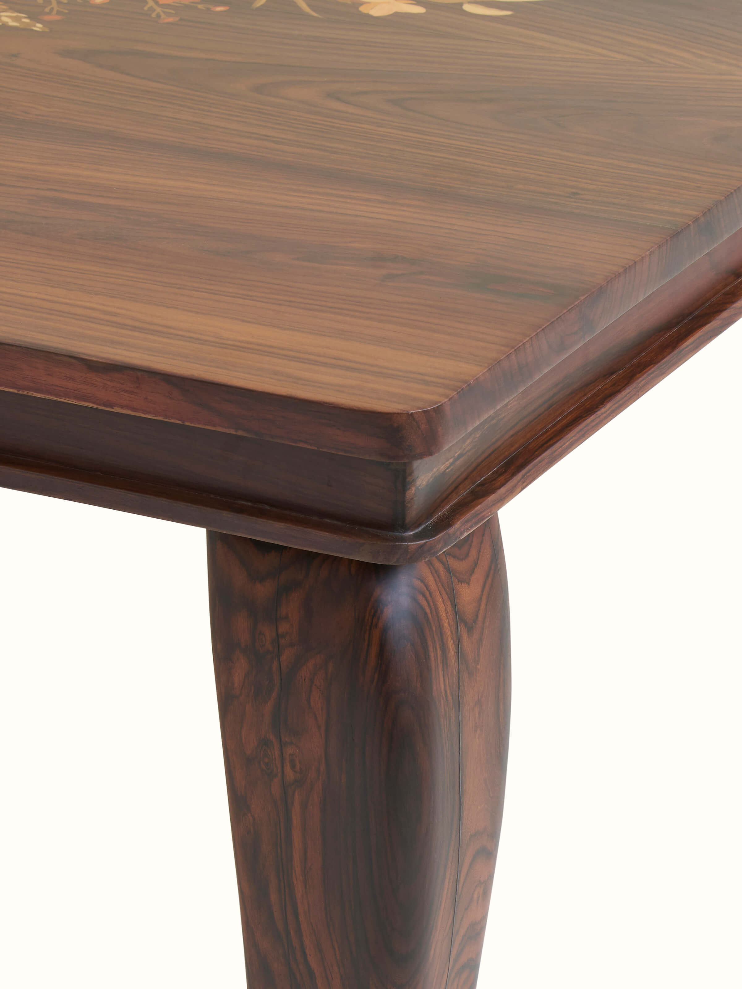 Detailed view of Rosewood Inlay 6-seater Dining Table showcasing the exquisite inlay design and quality wood finish.