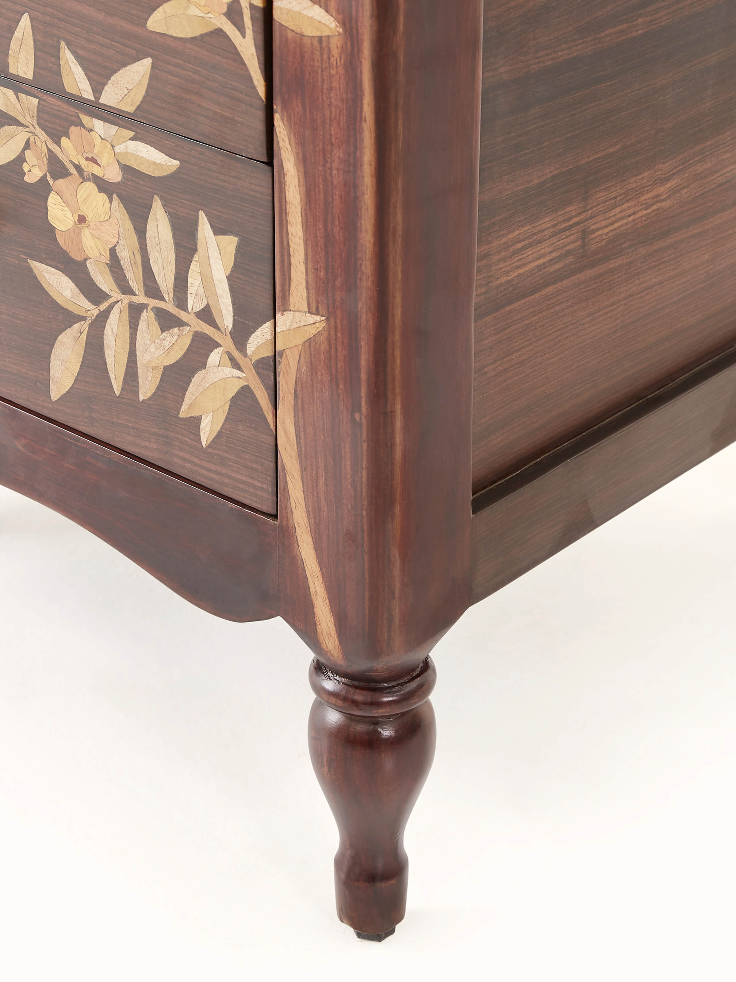 Angle view of the Mysore rosewood bedside table, displaying its elegant design and inlay craftsmanship