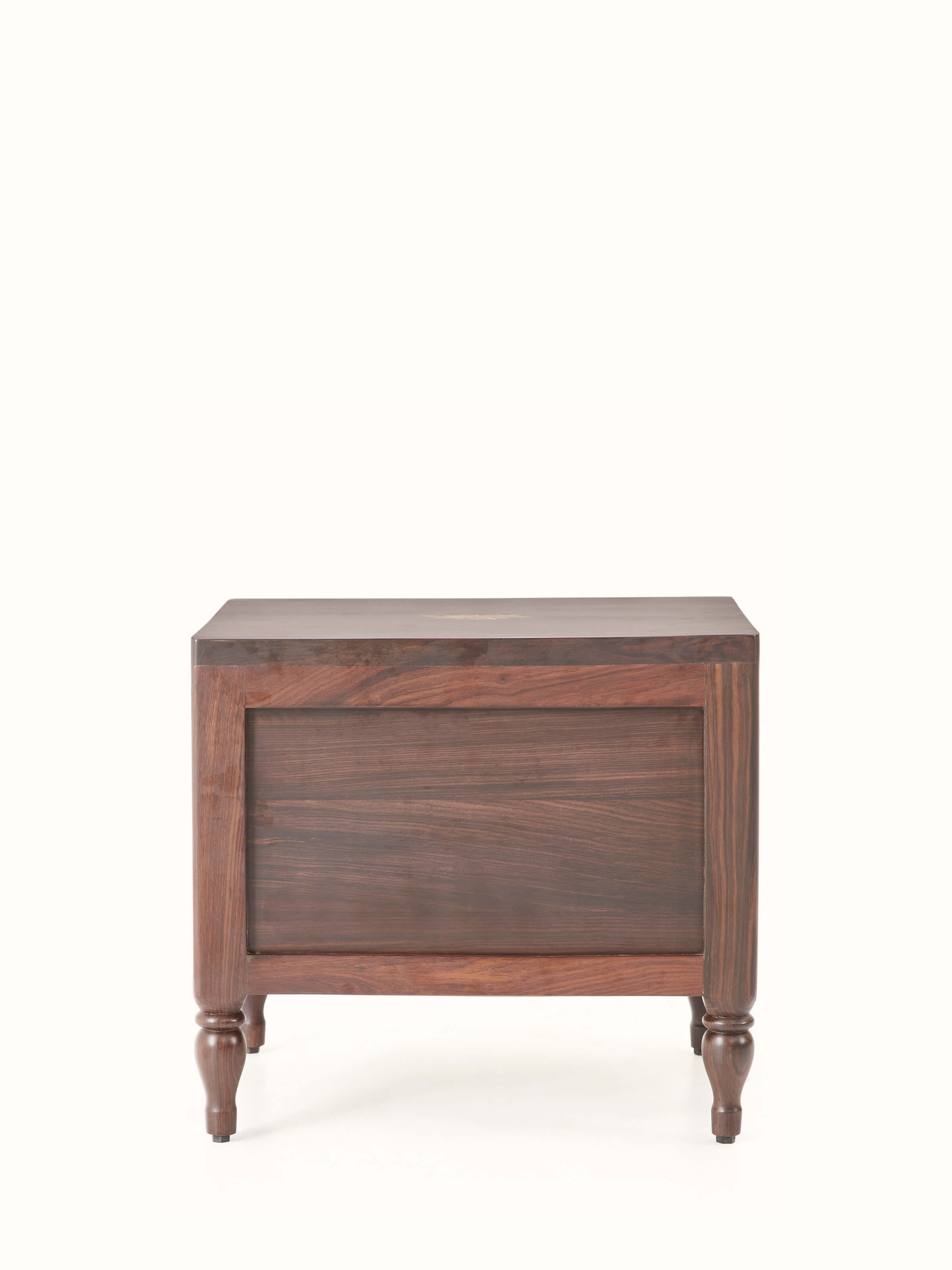 Close-up of the Mysore rosewood bedside table’s drawer with detailed inlay design