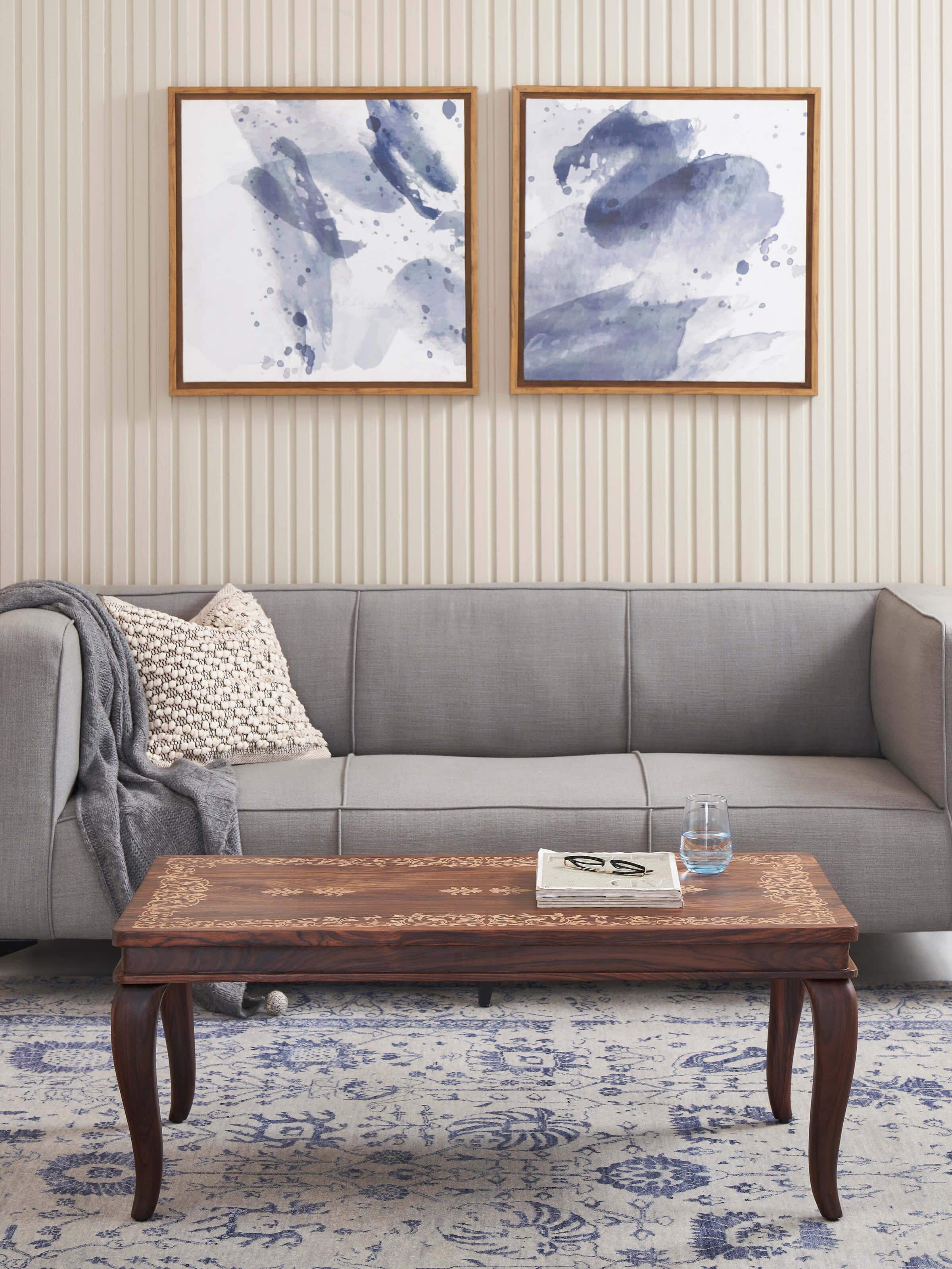 Side view of Rosewood Inlay Floral Coffee Table highlighting the detailed floral inlay and craftsmanship