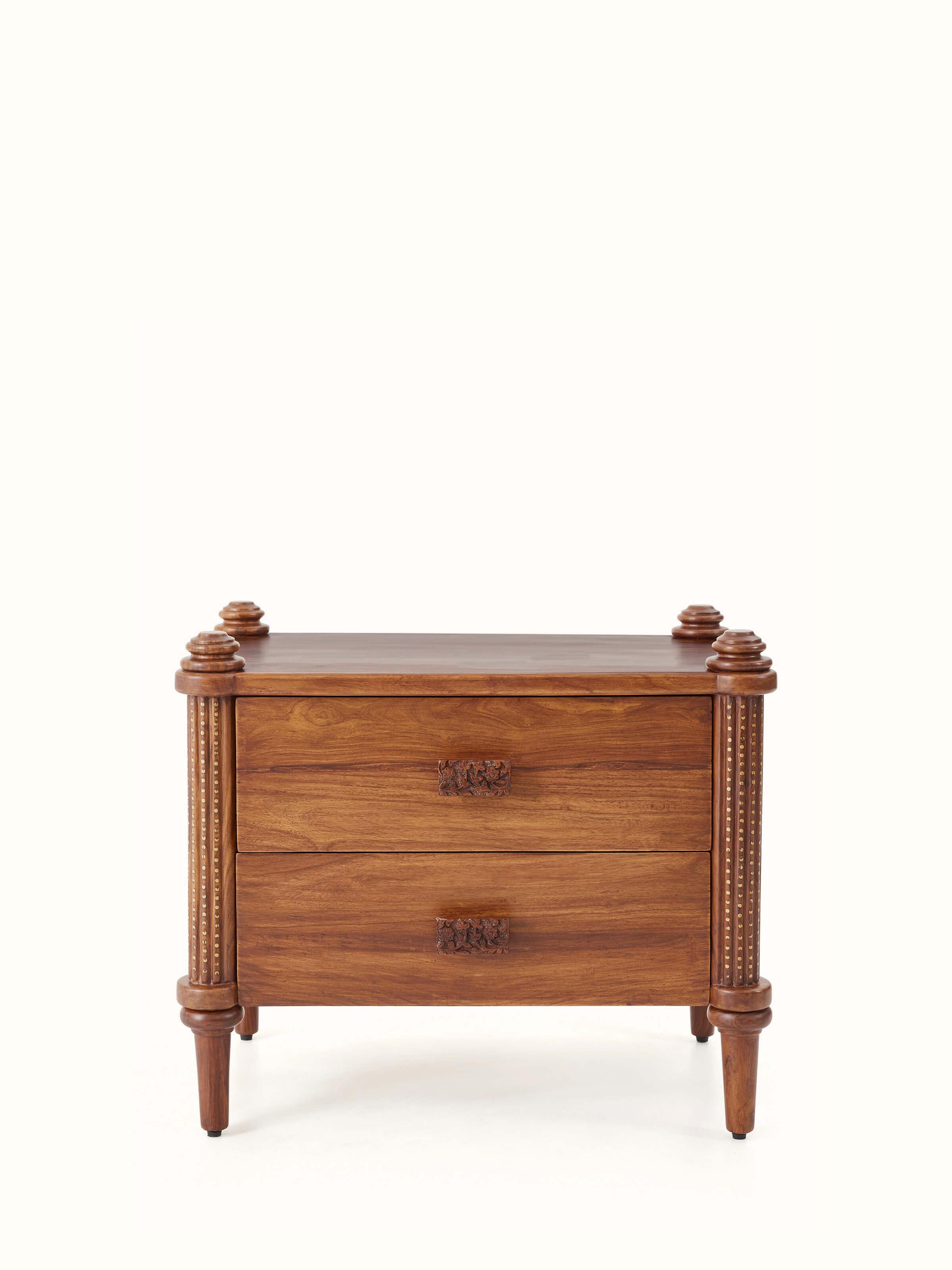 Front view of Carved Sheesham Wood Bedside Table showcasing intricate carvings and rich wood finish.