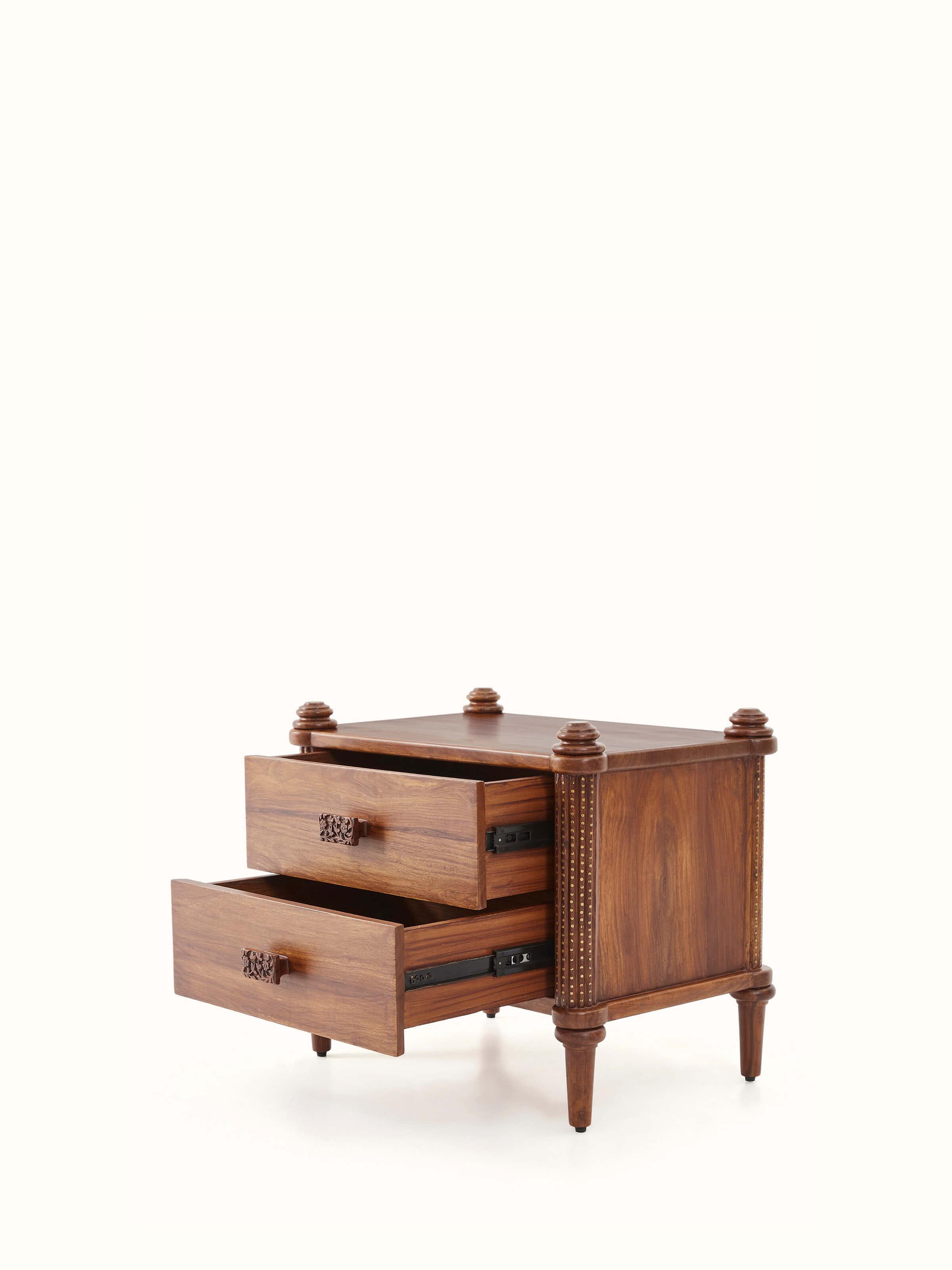 Close-up view of Carved Sheesham Wood Bedside Table with an open drawer, showcasing its spacious storage and design.