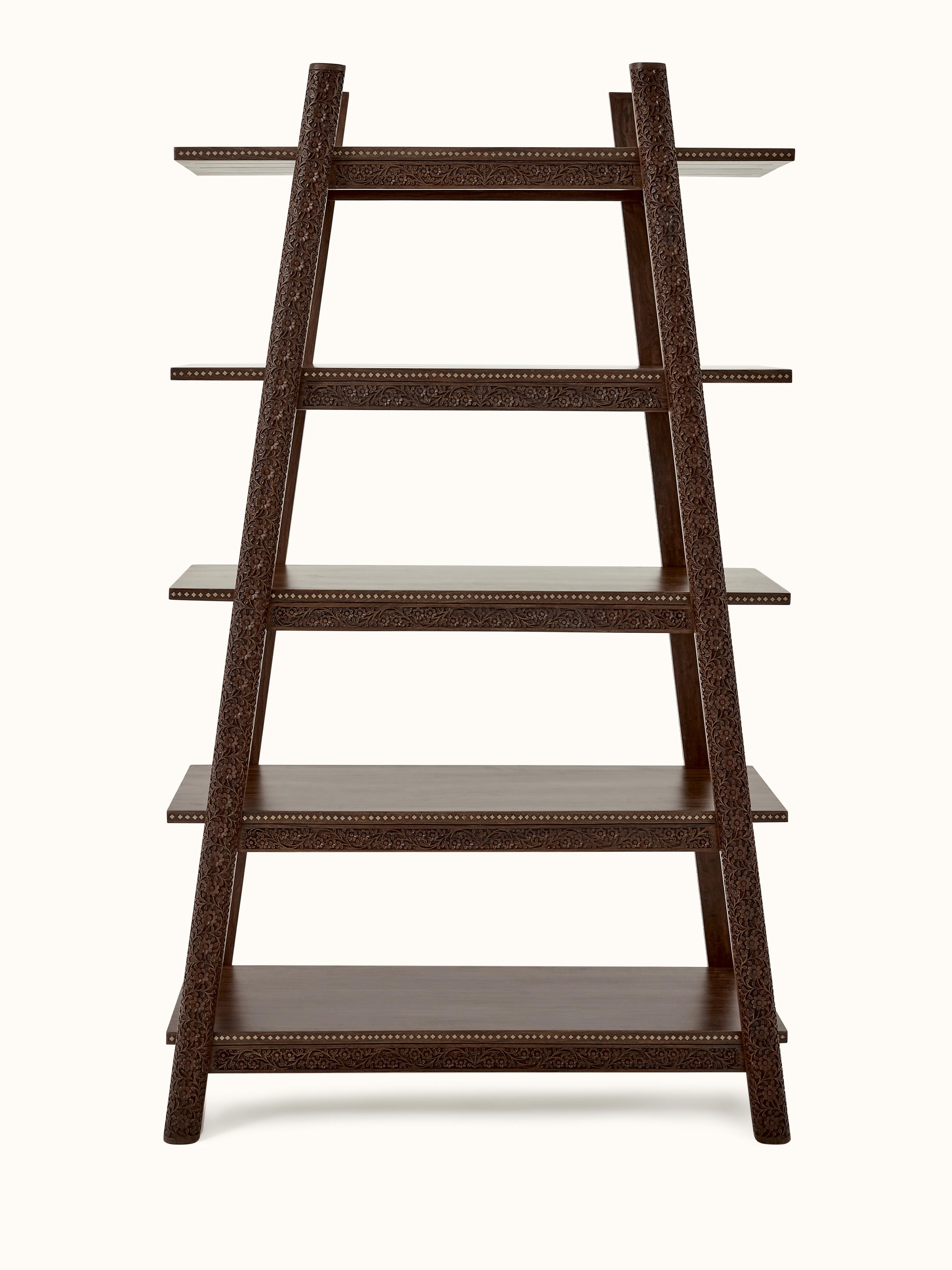 Front view of carved sheesham wood bookshelf, showcasing intricate woodwork and spacious shelves
