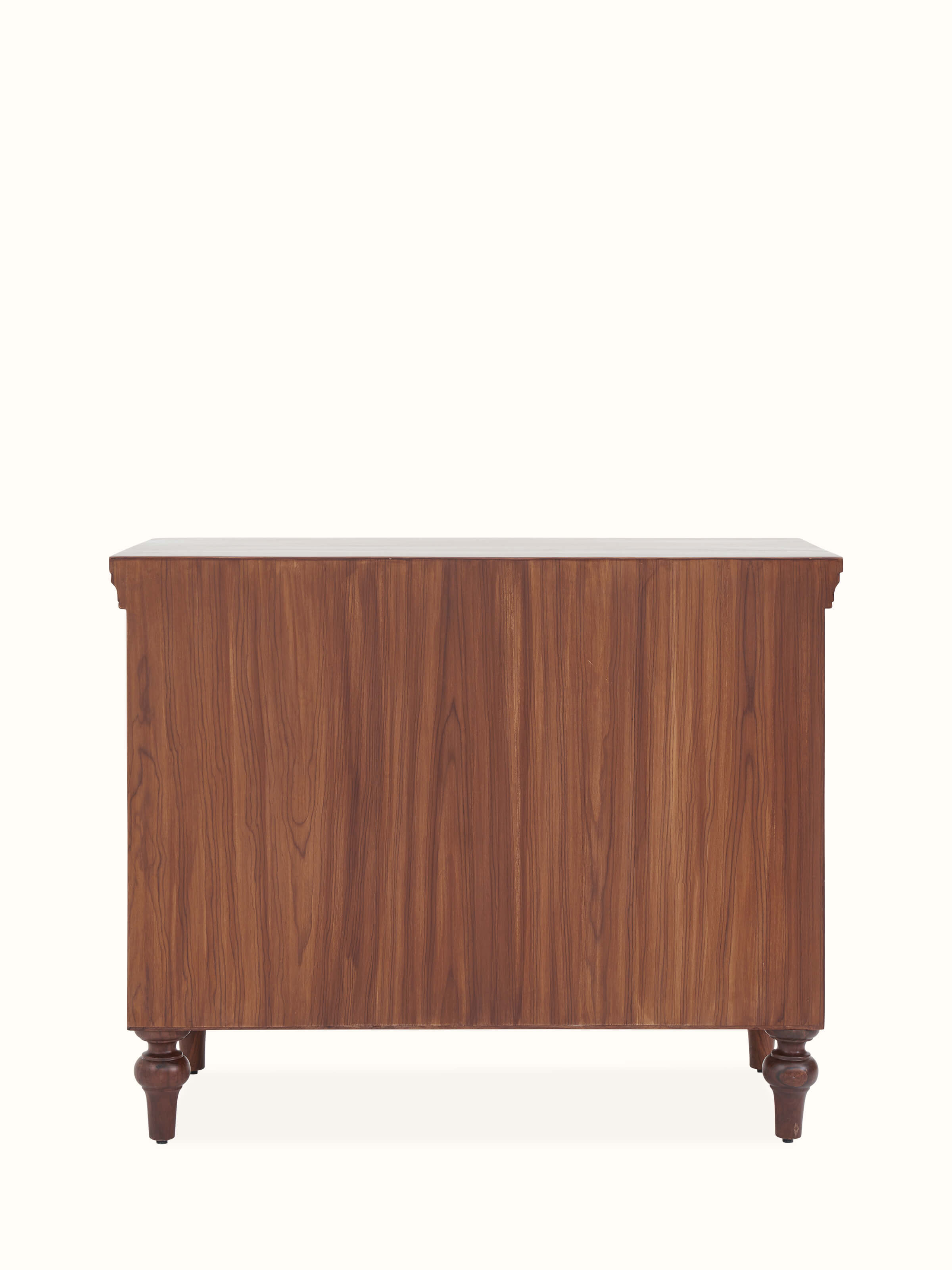 Back view of Carved Sheesham Chest of Drawers showcasing sturdy construction and smooth wood surface.