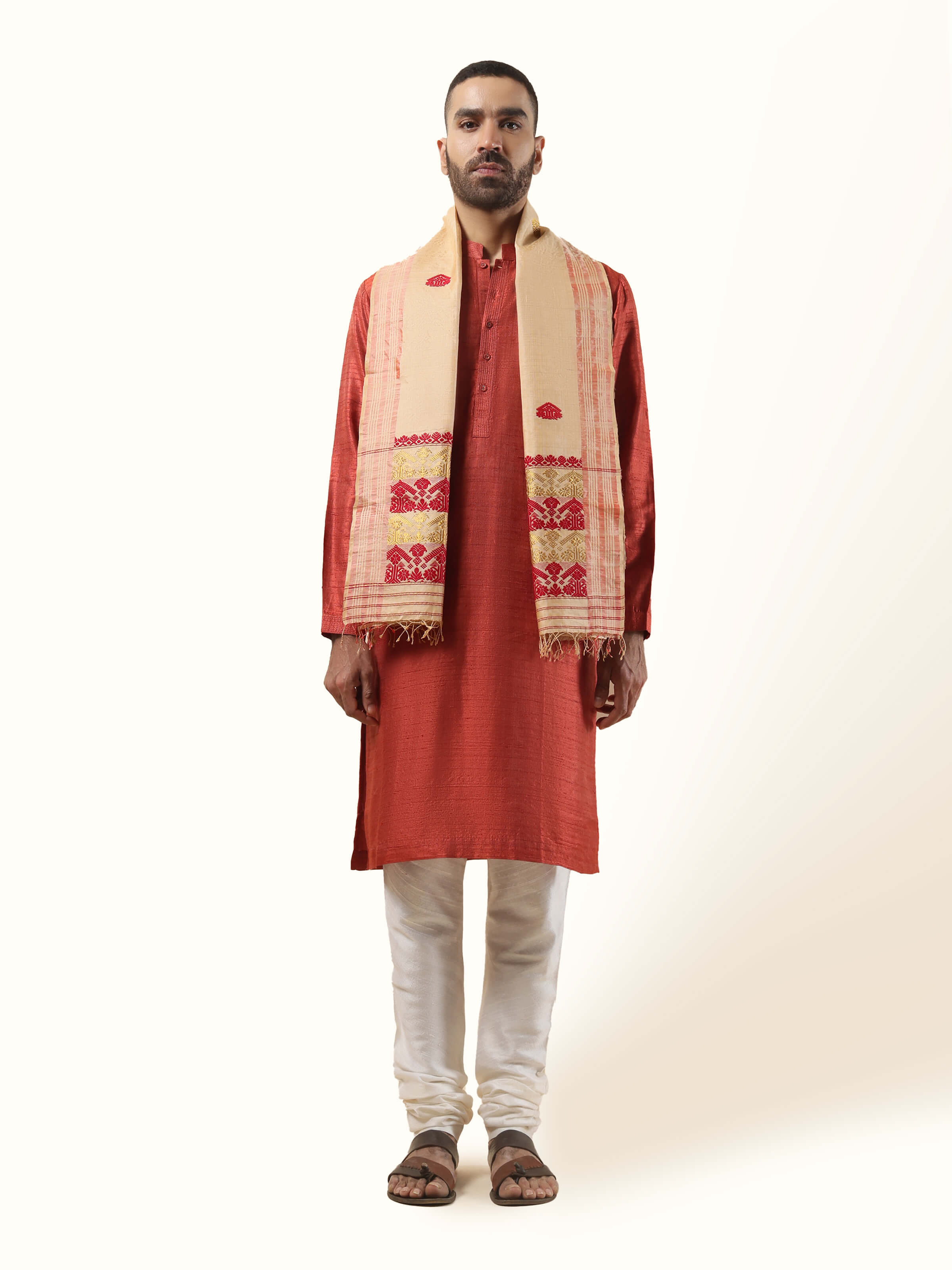 Front view of peach tussar silk stole with delicate handwoven texture and soft sheen