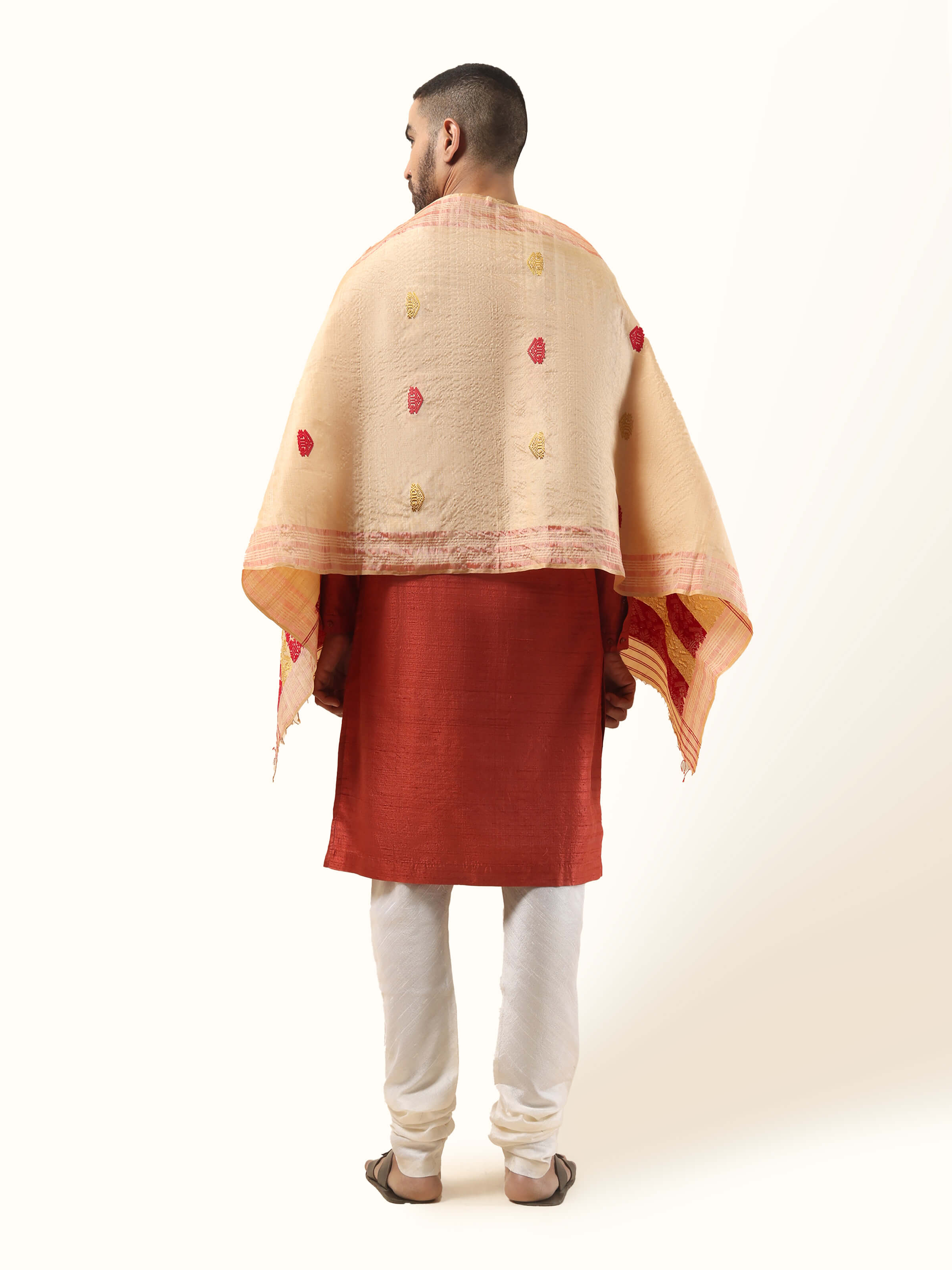 Back view of peach tussar silk stole displaying complete length and fall