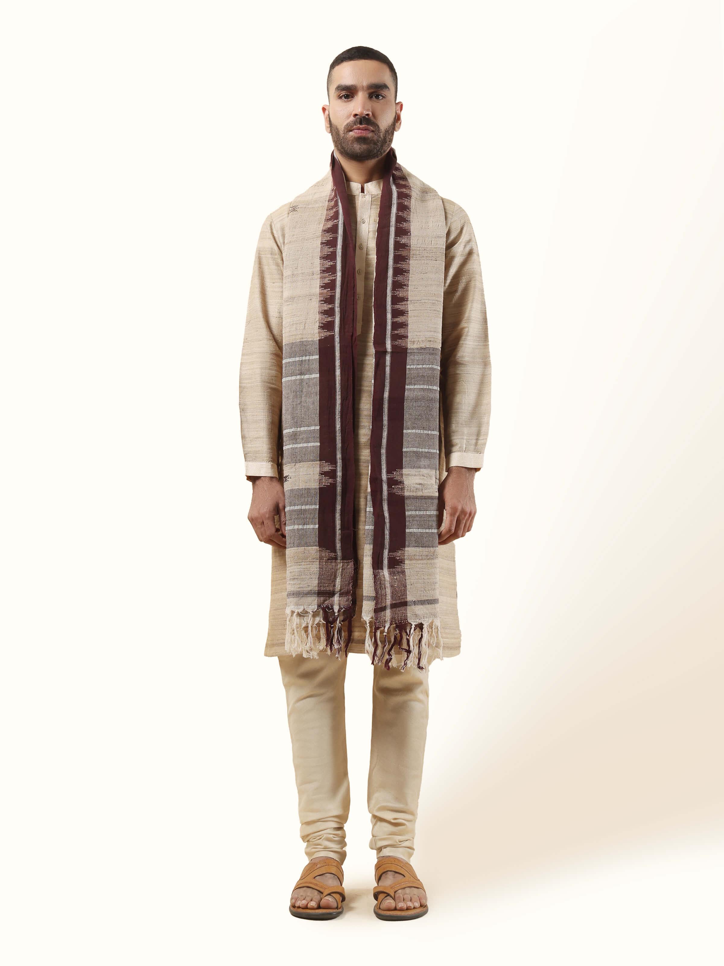 Front view of brown Kotpad stole in tussar cotton with tribal patterns.