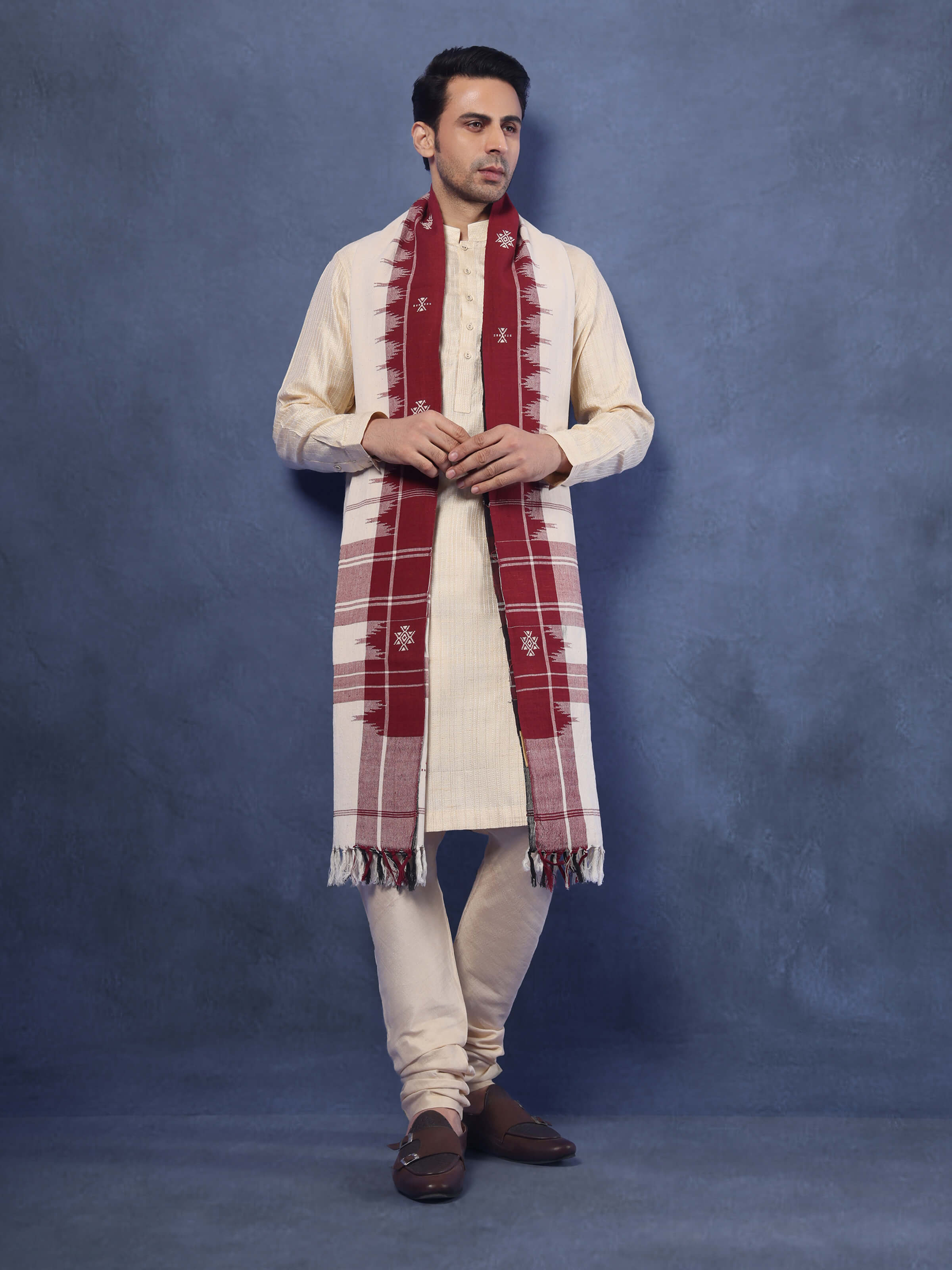 Lifestyle view of brown Kotpad stole styled with neutral outfit for ethnic elegance