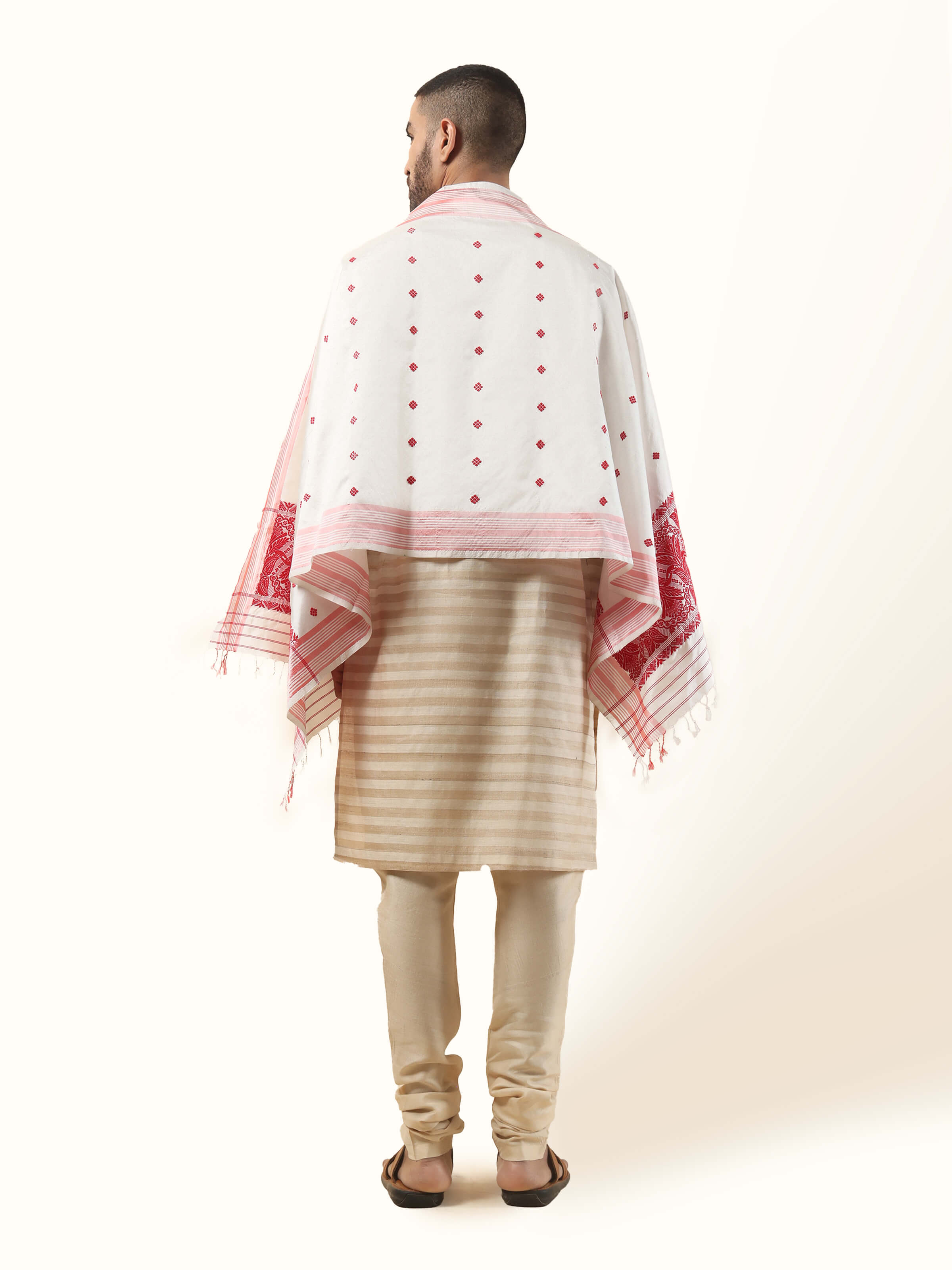 Back view of white mulberry silk stole folded neatly, emphasizing smooth silk surface and craftsmanship.