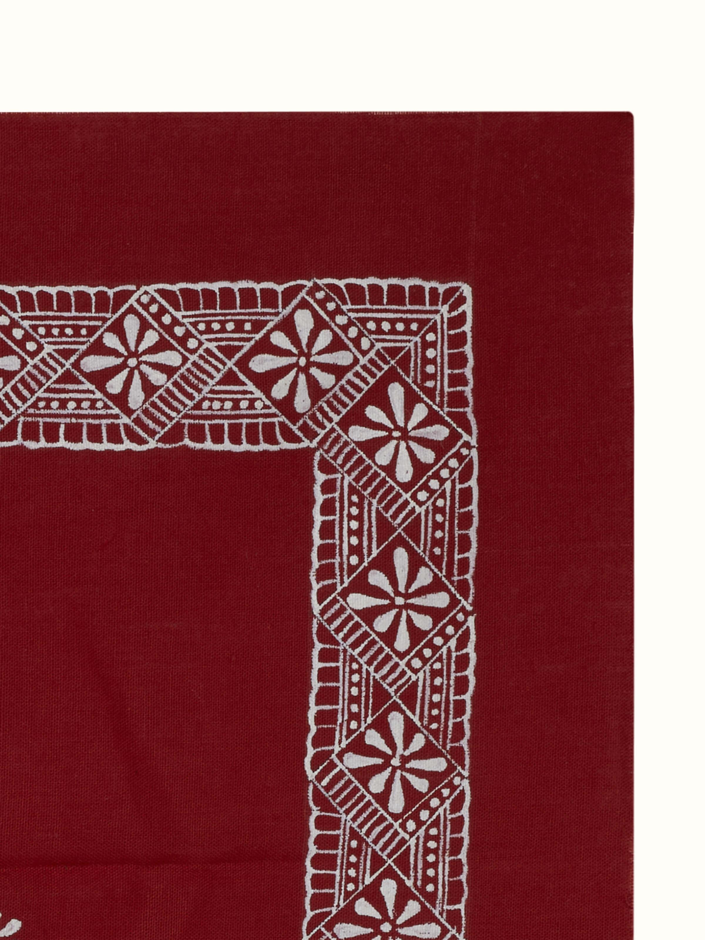 Side view of Aipan Ganesh Chowki mandala painting, showcasing its detailed artwork and decorative motifs.