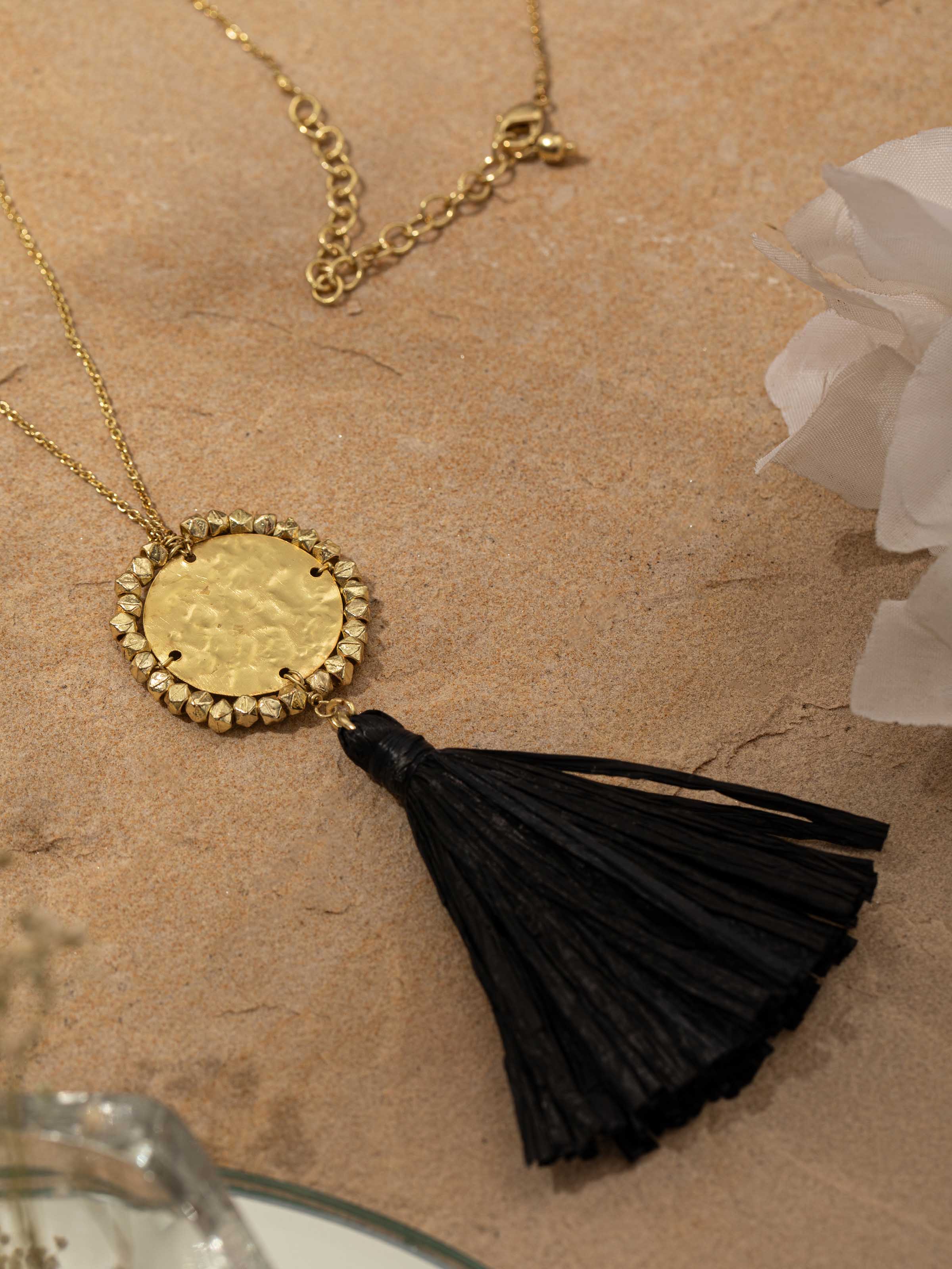 Detailed view of Raffia fibre long necklace emphasizing natural texture