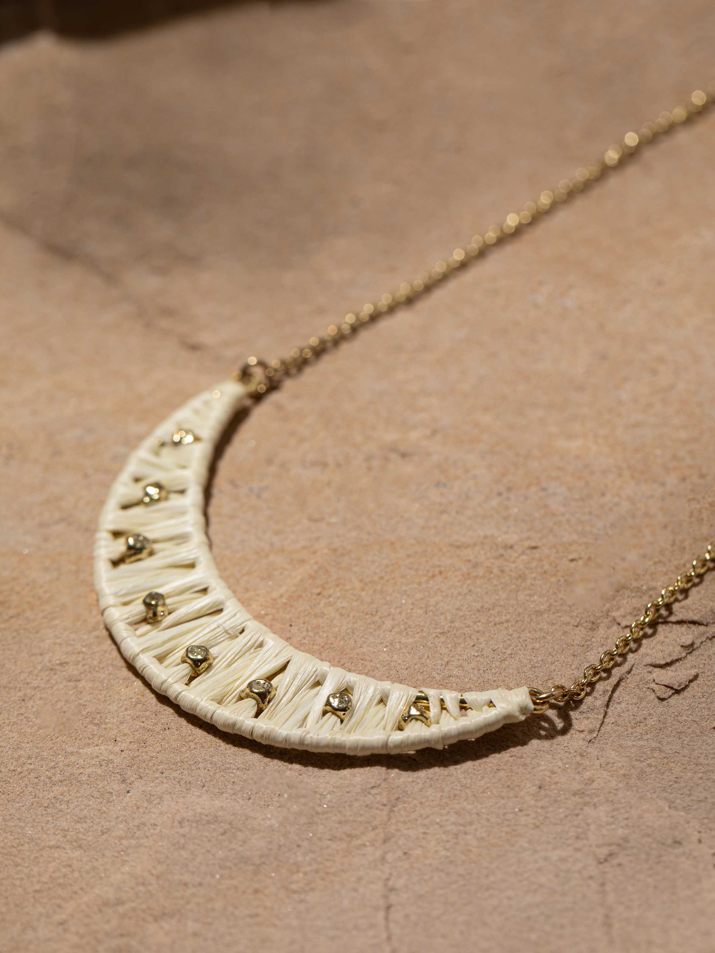 Detailed view of Raffia fibre long necklace highlighting the craftsmanship and unique material