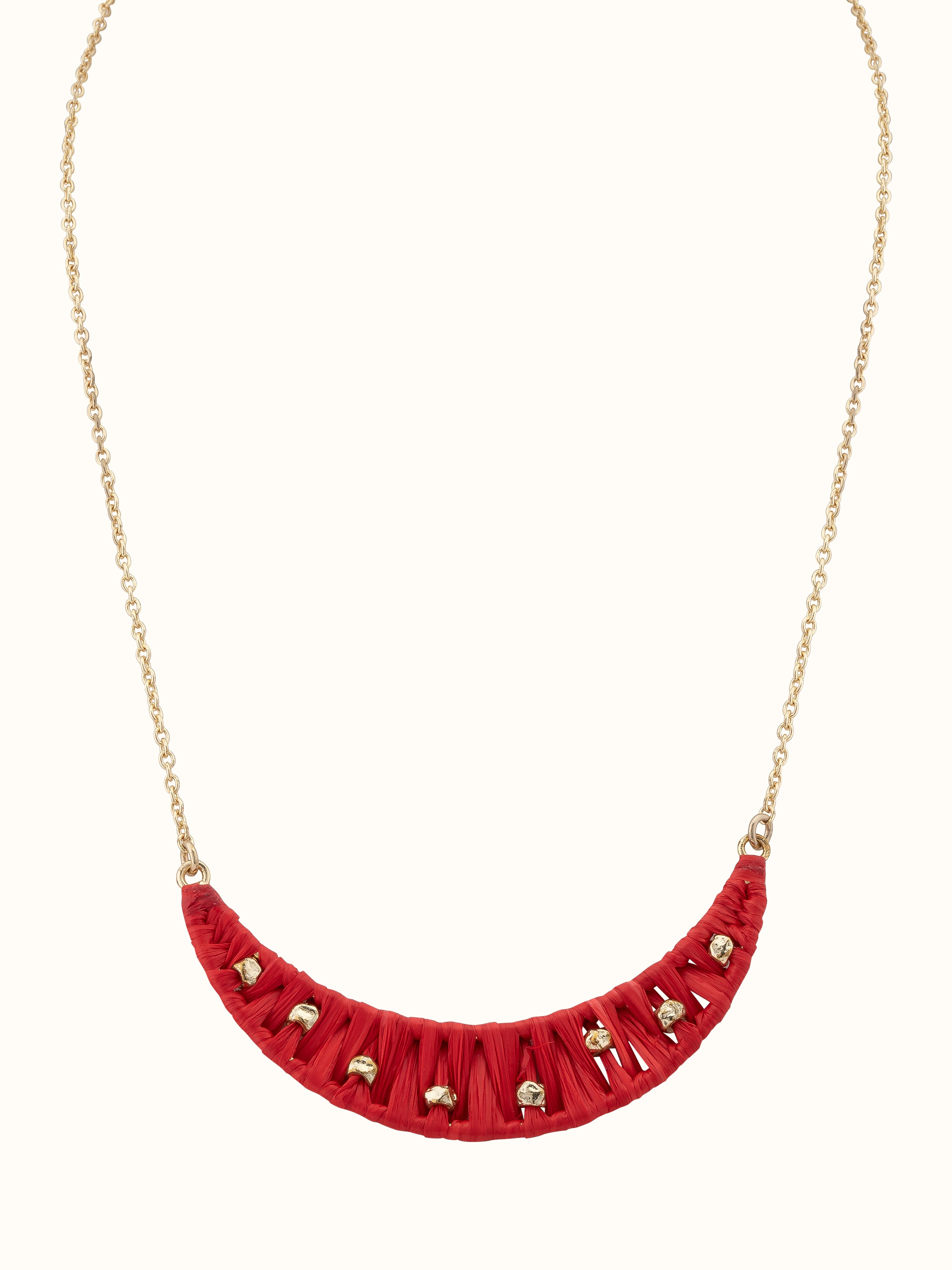 Front view of raffia fibre long necklace showcasing its textured design and length.