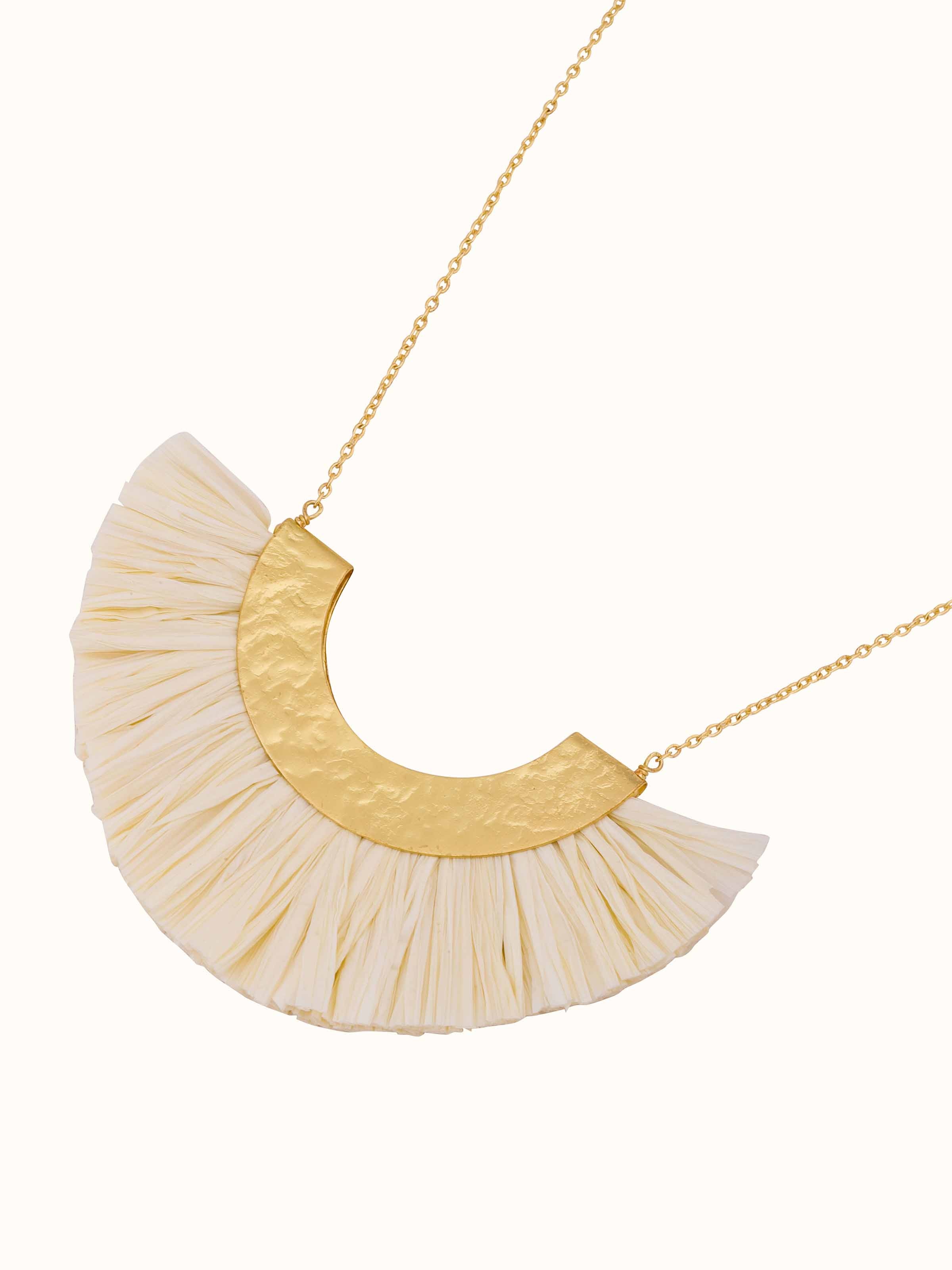 Angled view of Raffia Fibre Long Necklace emphasizing its elegant drape and design.
