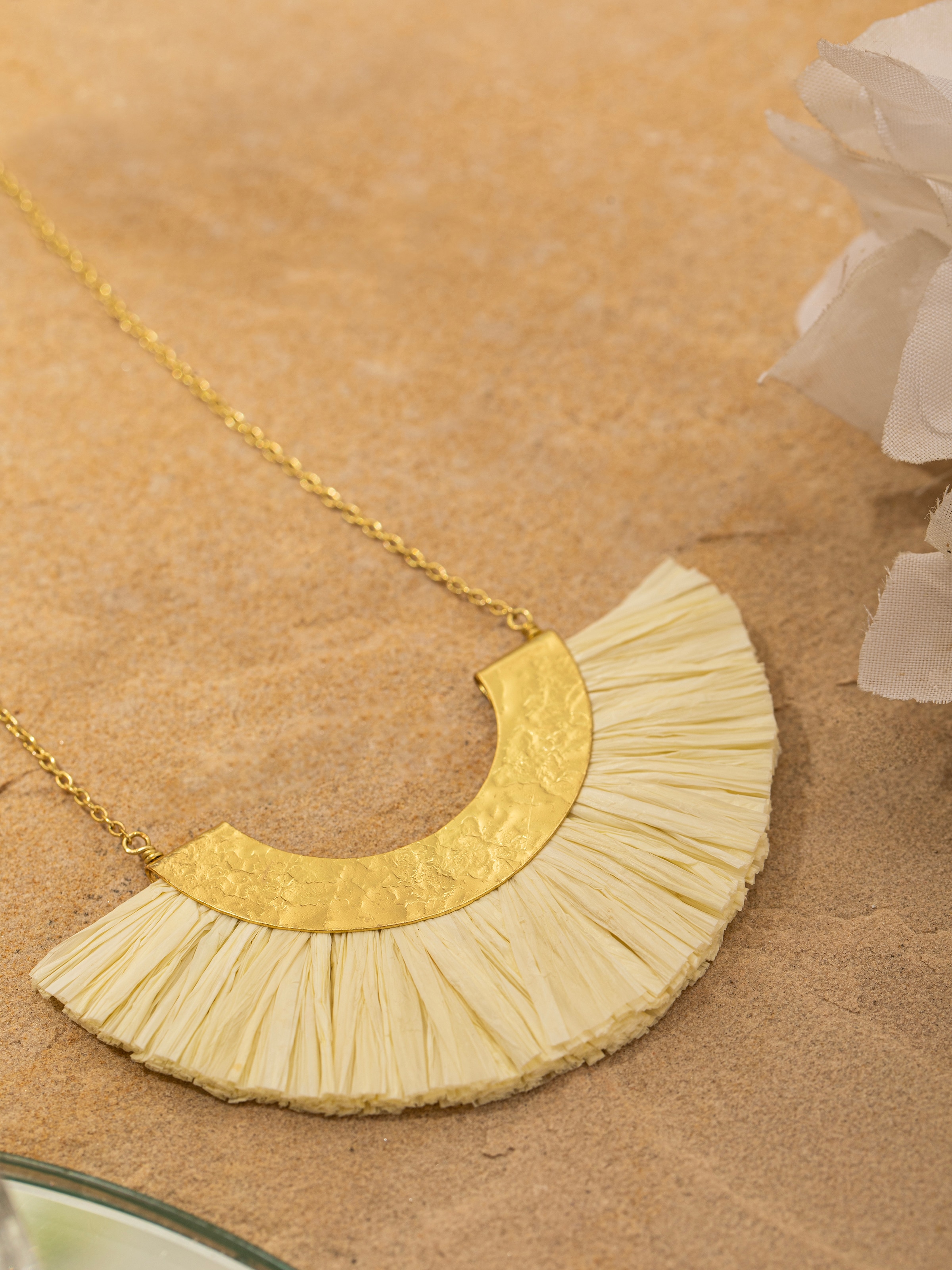 Detailed view of Raffia Fibre Long Necklace from a distance to showcase the overall design.