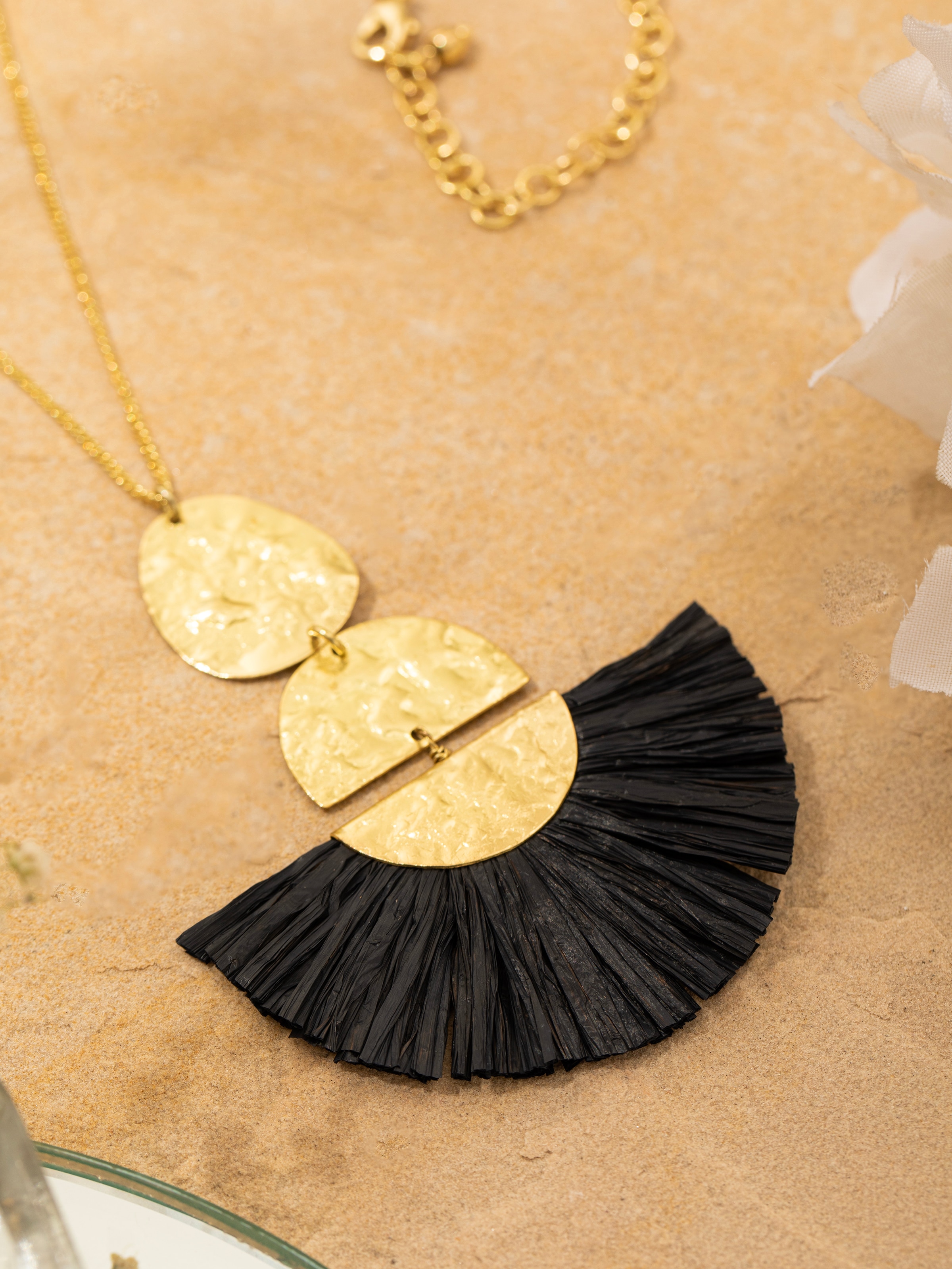 Detailed front view of Raffia fibre long necklace showcasing intricate design