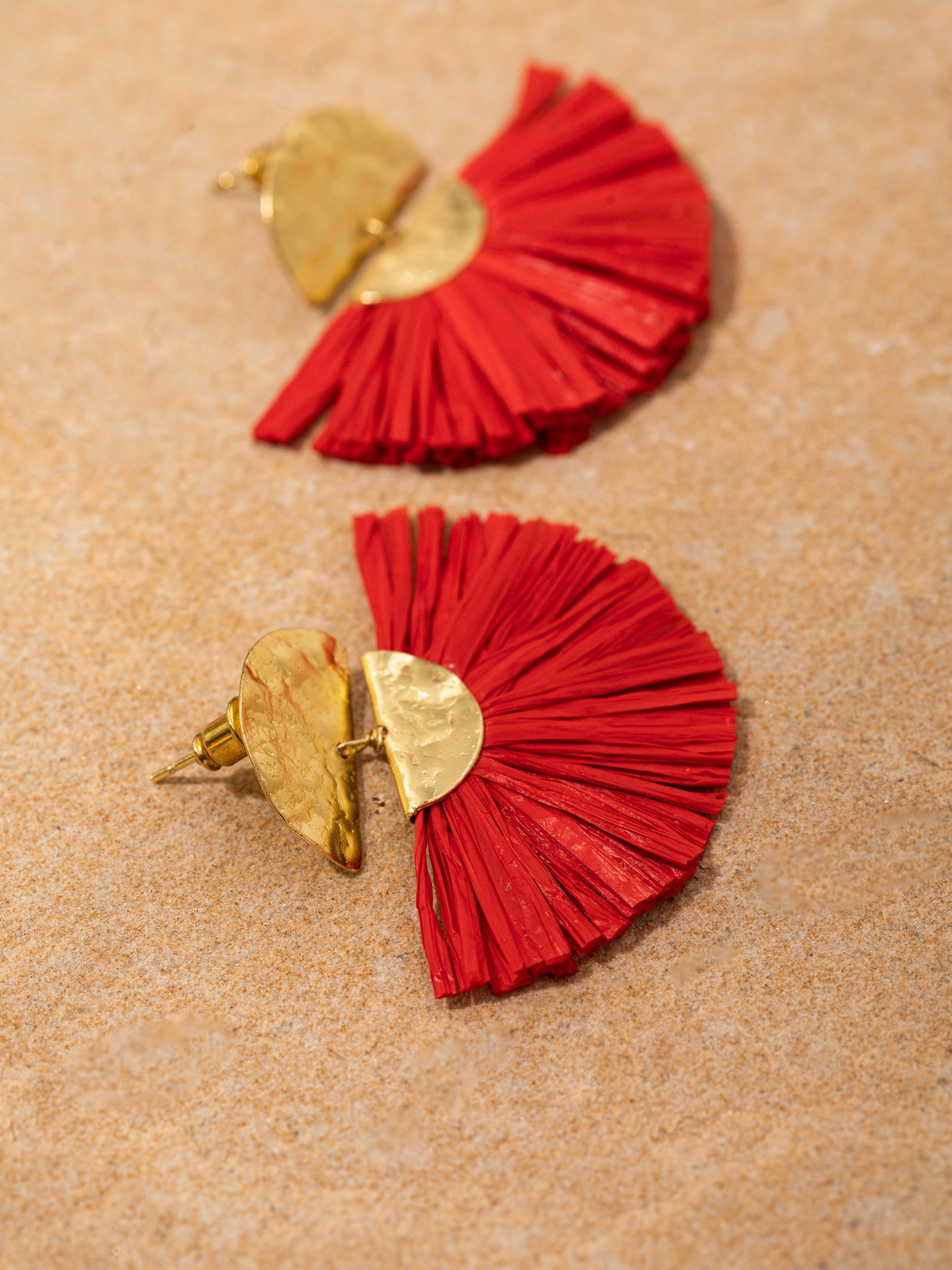 Close-up front view of Raffia fibre drop earrings showcasing their handcrafted details and natural aesthetic