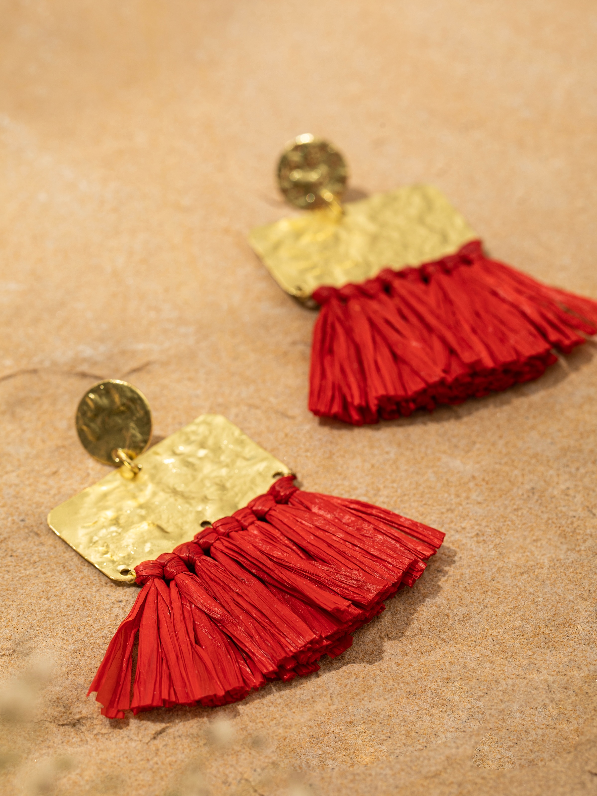 Back view of Raffia Fibre Drop Earrings highlighting the hook and overall design.