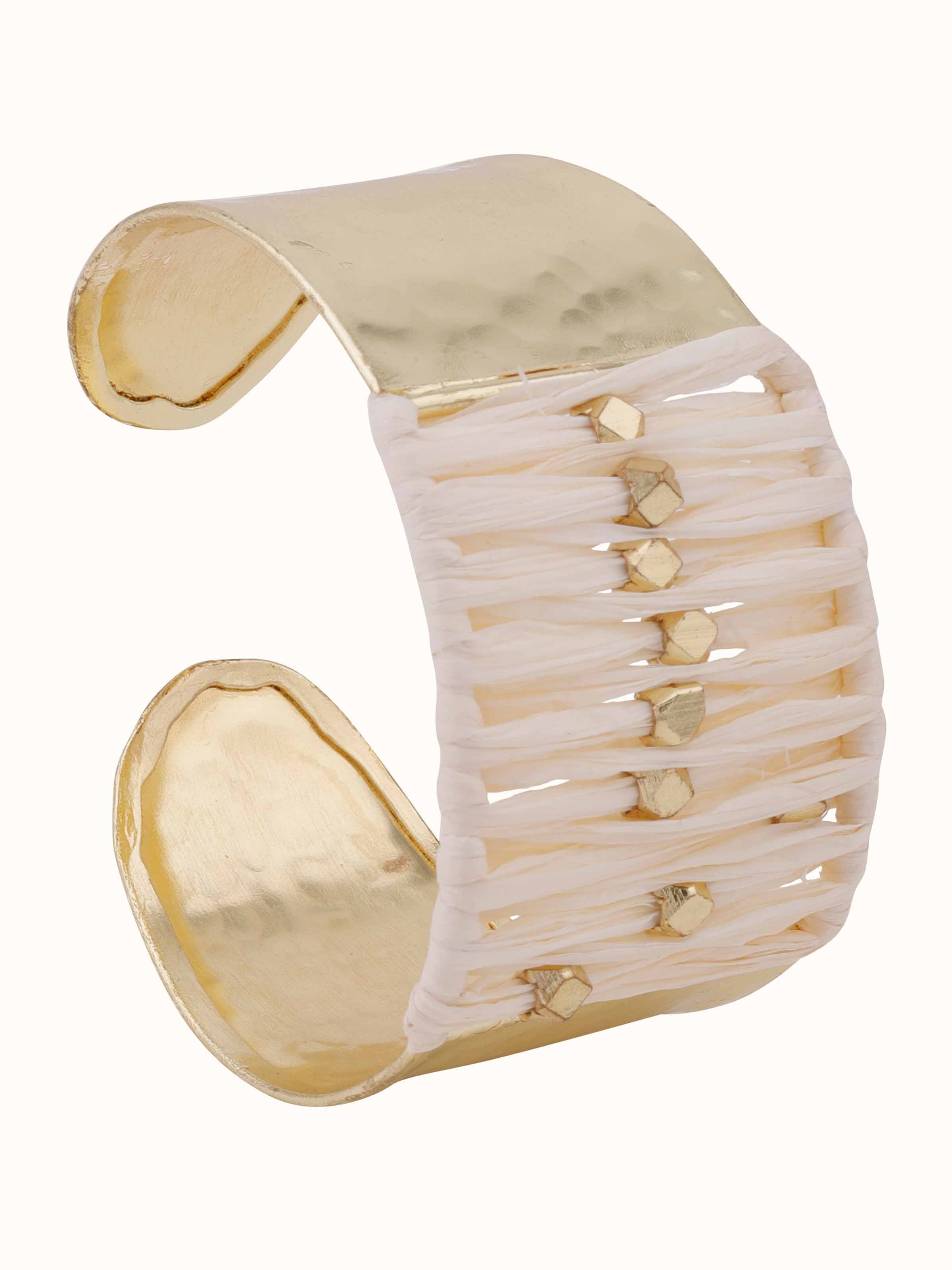 Front view of Raffia fibre hand cuff featuring natural texture.