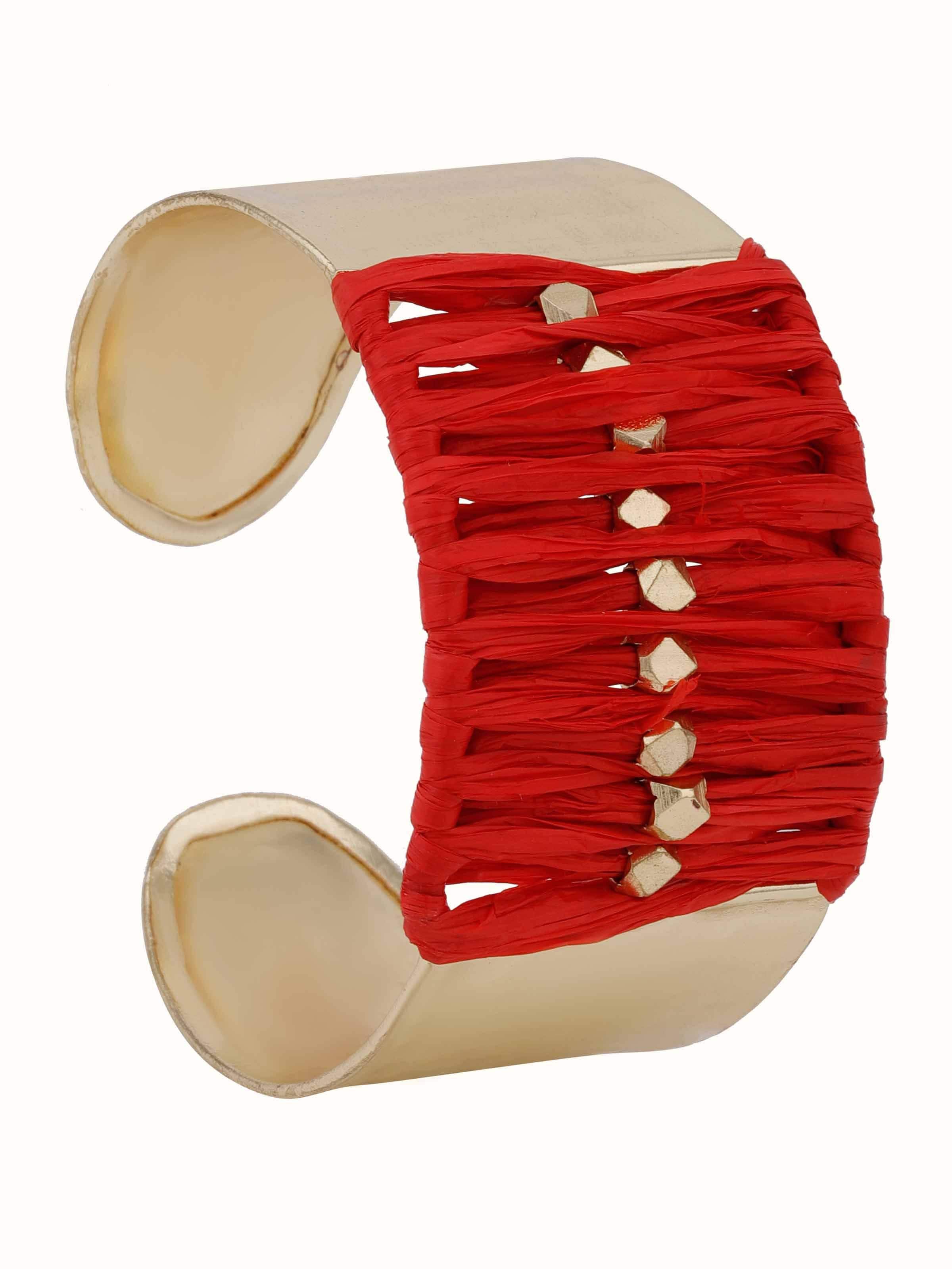 Front view showcasing the woven raffia fibre hand cuff design