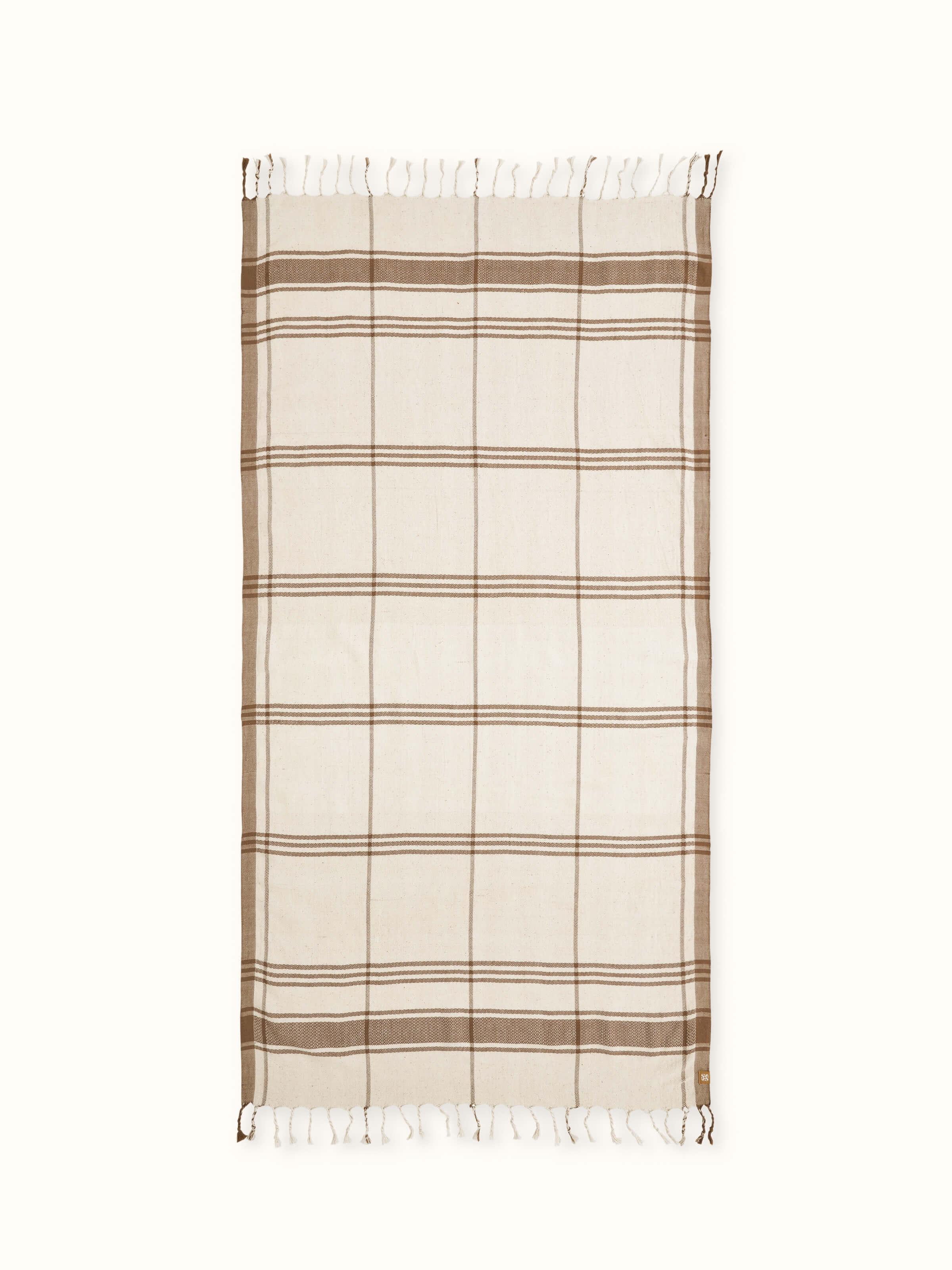 Full view of Sarvika Brown Checks Cotton Bath Towel (M), showcasing the brown checkered pattern and soft cotton fabric.
