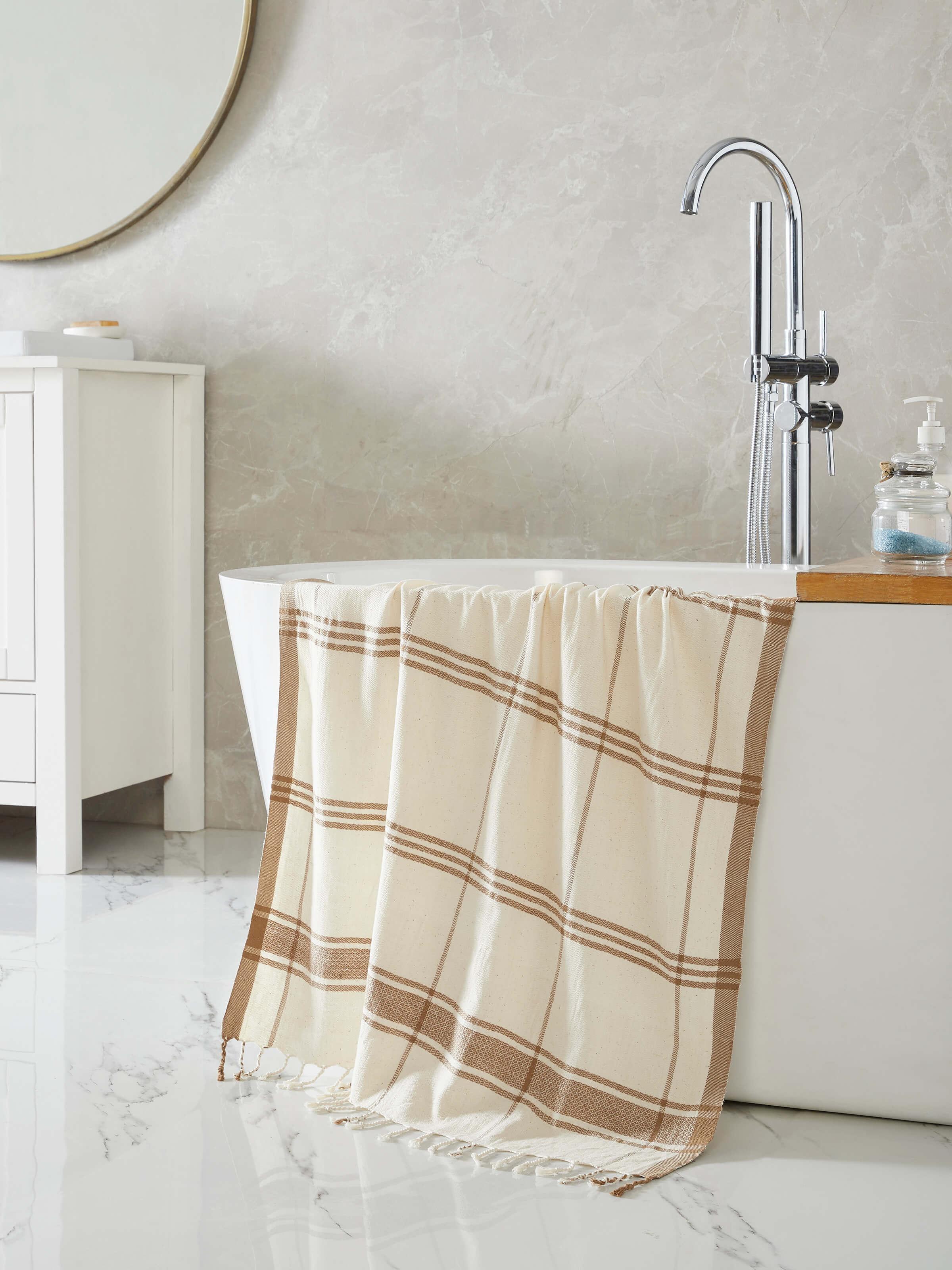 Close-up of Sarvika Brown Checks Cotton Bath Towel (M), highlighting the checkered design and smooth texture of the cotton fabric.