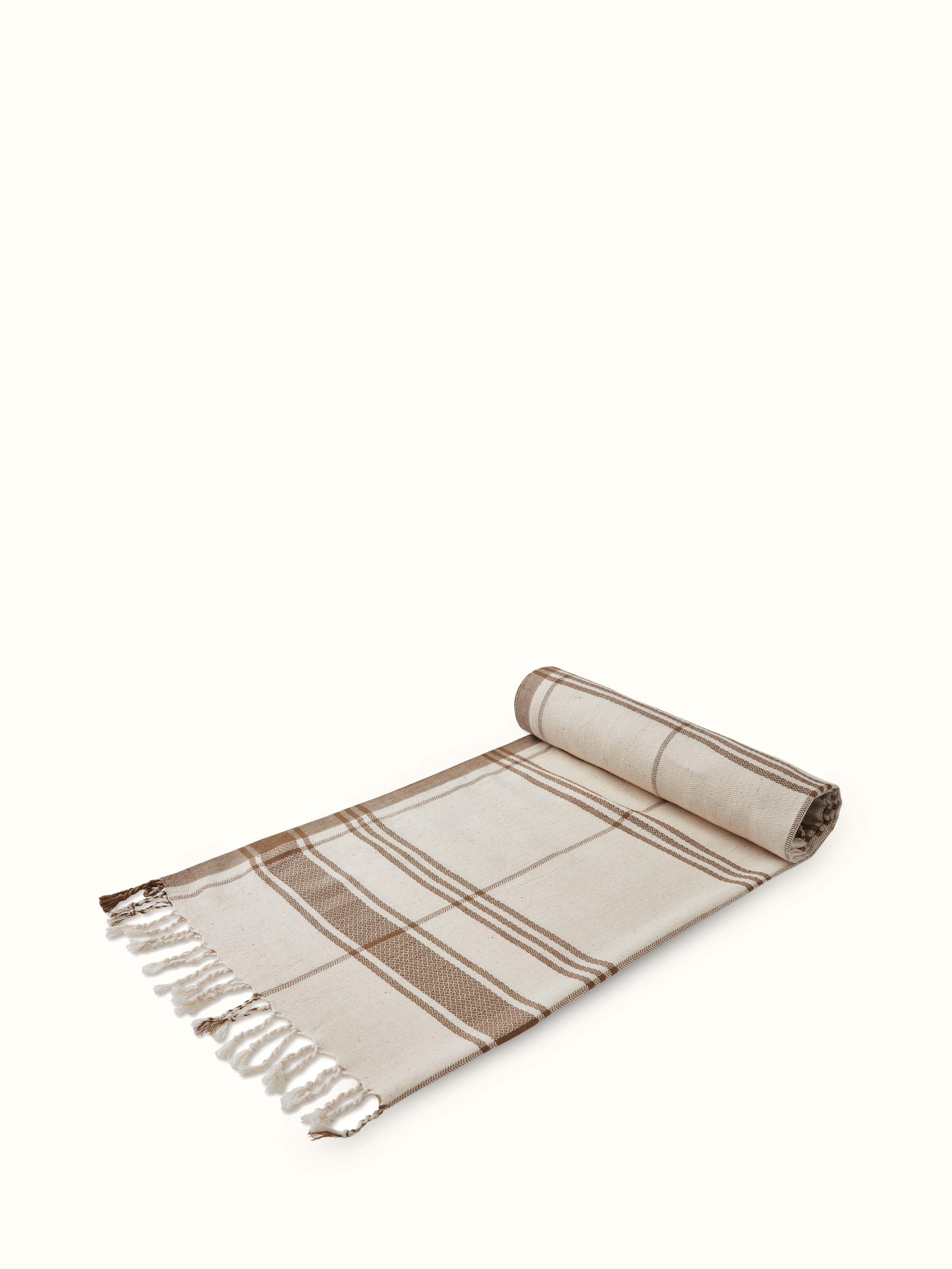 Detailed view of Sarvika Brown Checks Cotton Bath Towel (M), emphasizing the soft texture and intricate checkered pattern.
