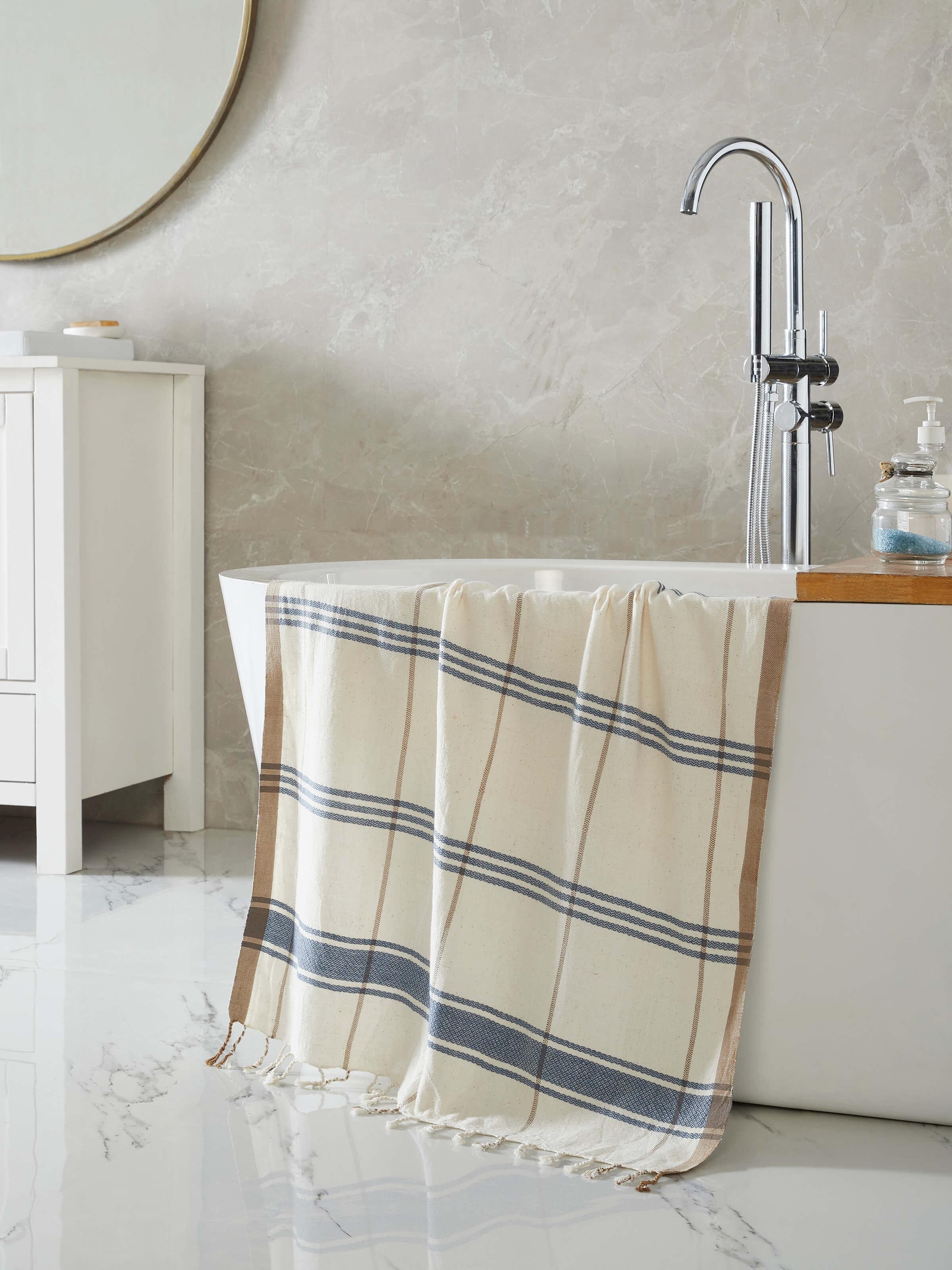 Close-up of Sarvika blue checks cotton bath towel (M) highlighting the texture and checkered design.