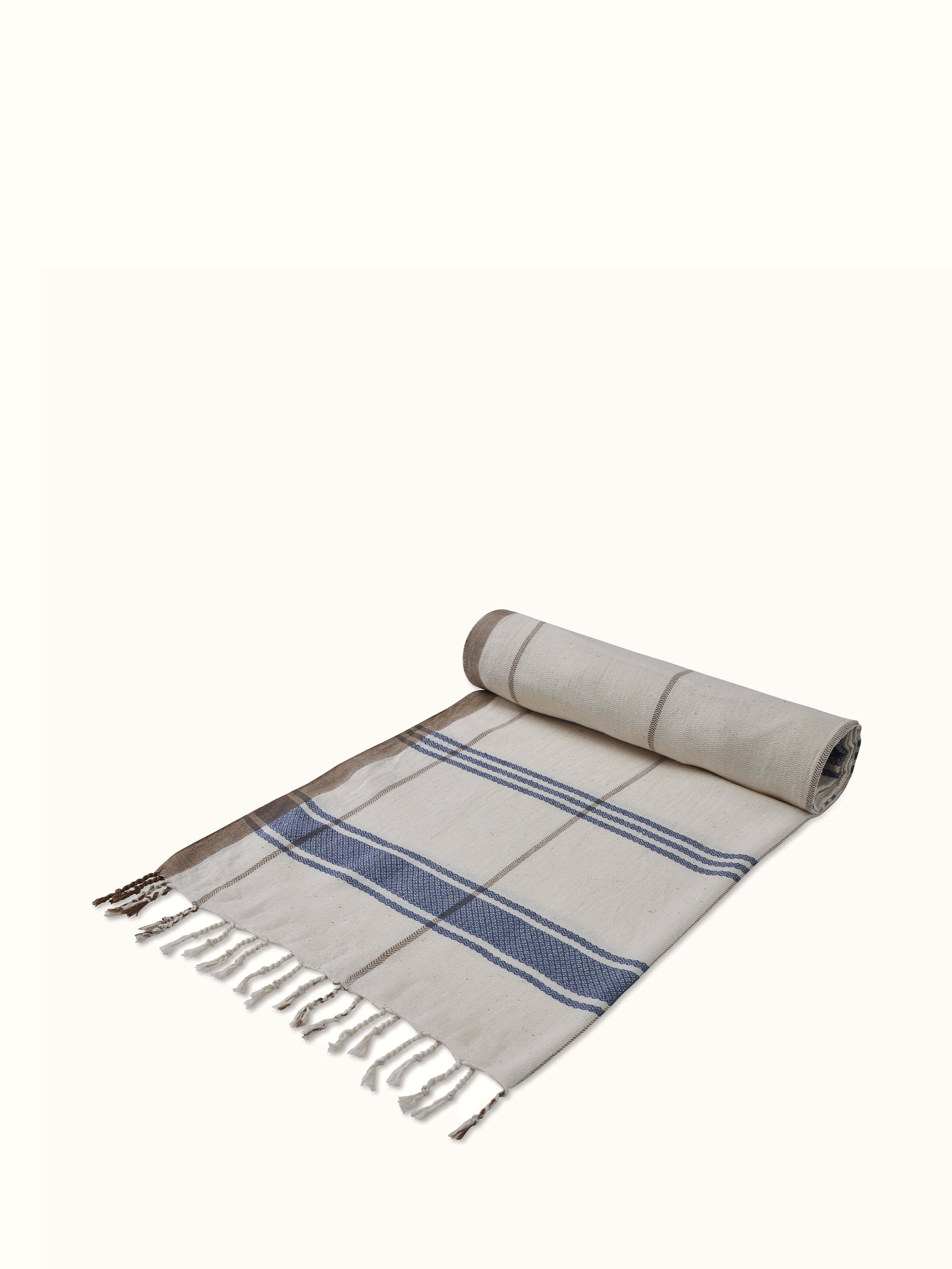 Angled view of Sarvika blue checks cotton bath towel (L) displaying its full pattern and utility.