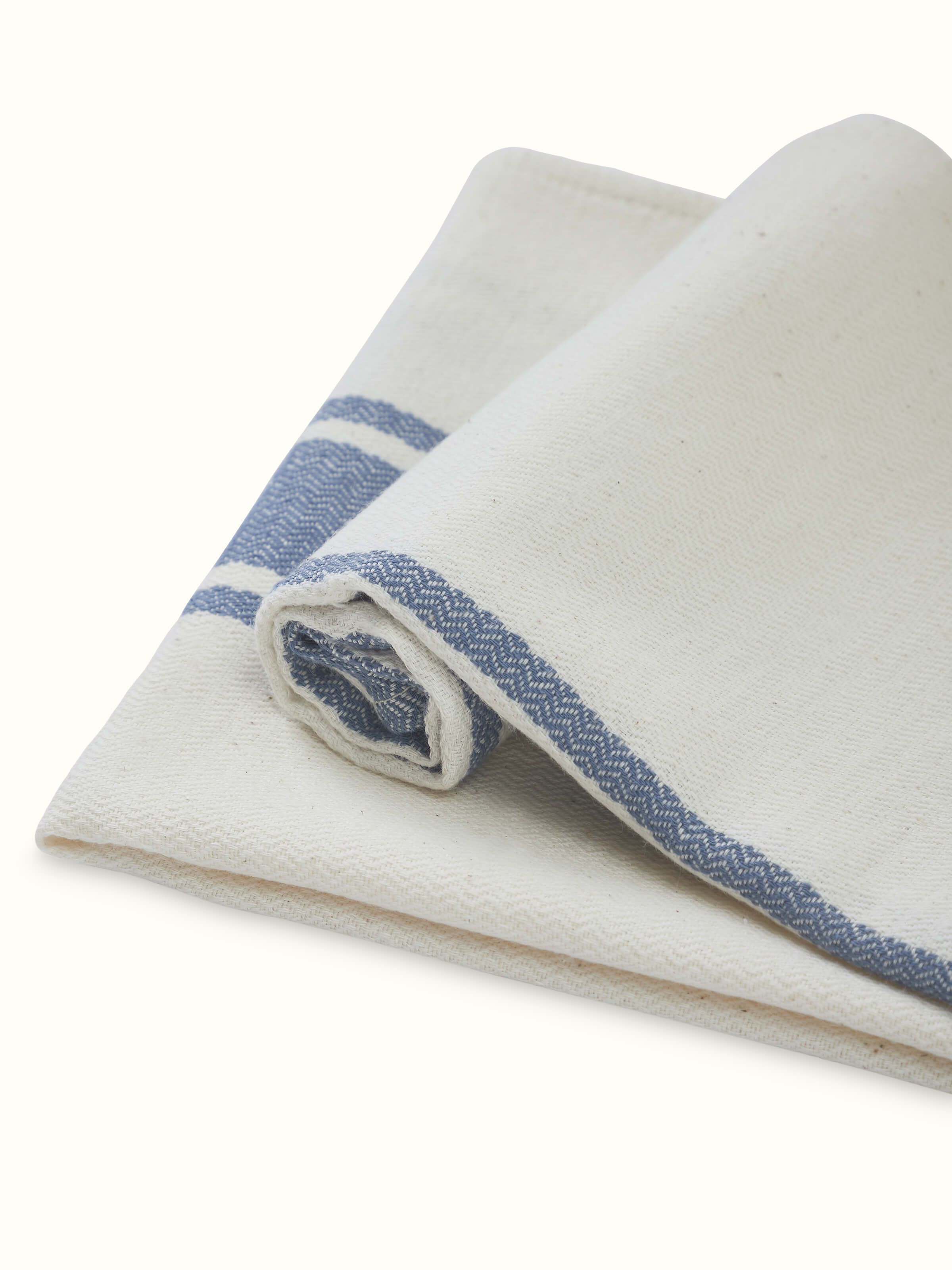 Sarvika blue checks cotton hand towels (2 pcs) folded to highlight the check pattern and cotton material.