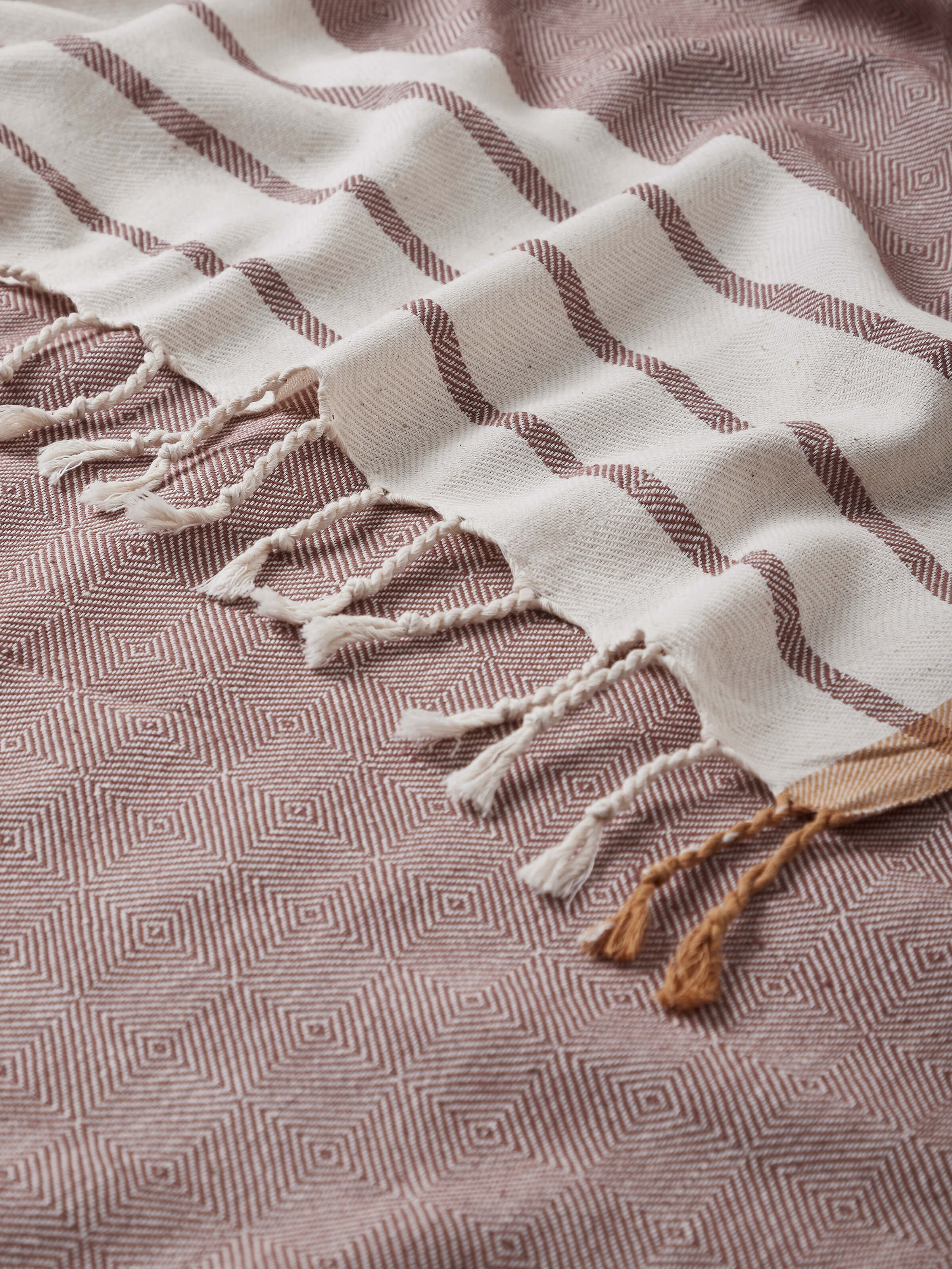 Front view of Samitha Red Stripe Cotton Bath Towel (L) displaying the full length and stripe pattern.