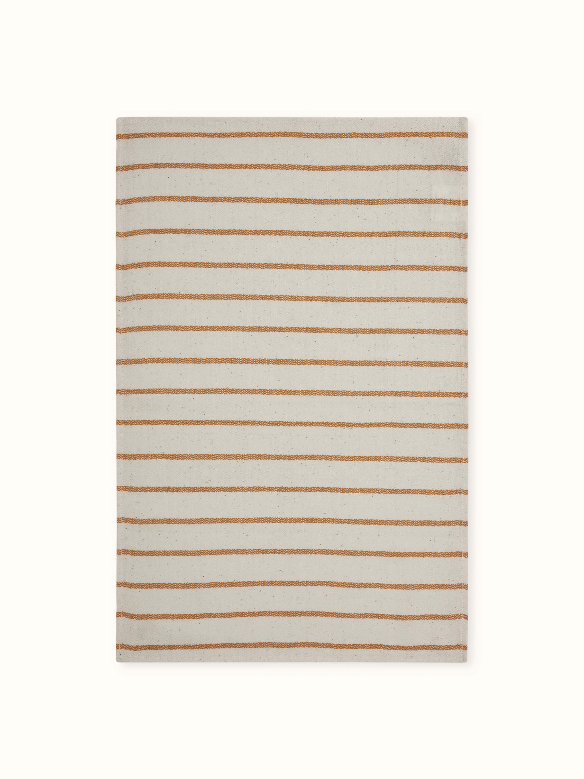 Samitha rust stripe cotton hand towel, focusing on the fabric's soft texture and color.
