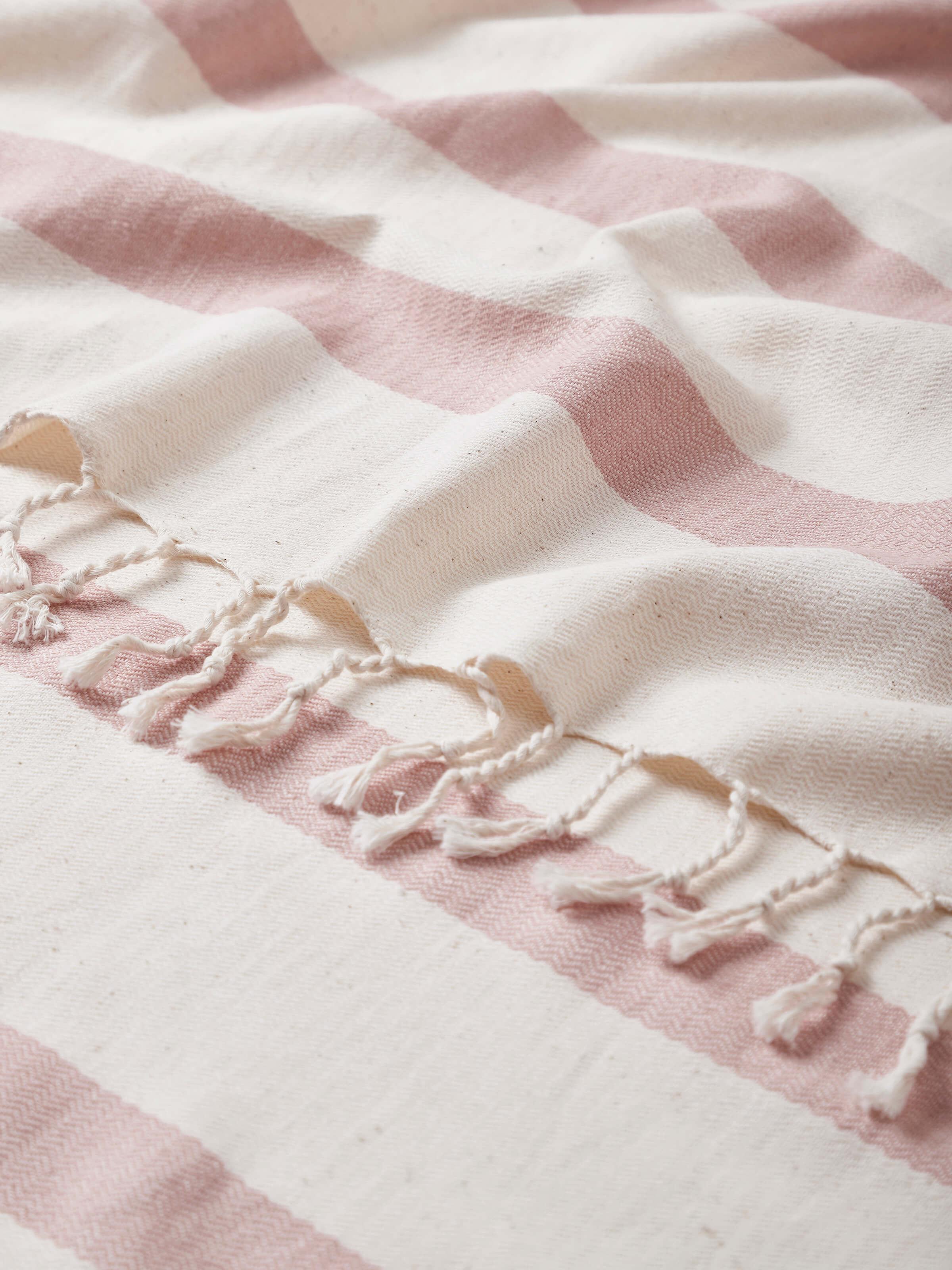 Detailed shot of Salya red stripe cotton striped bath towel (L) highlighting texture and weave