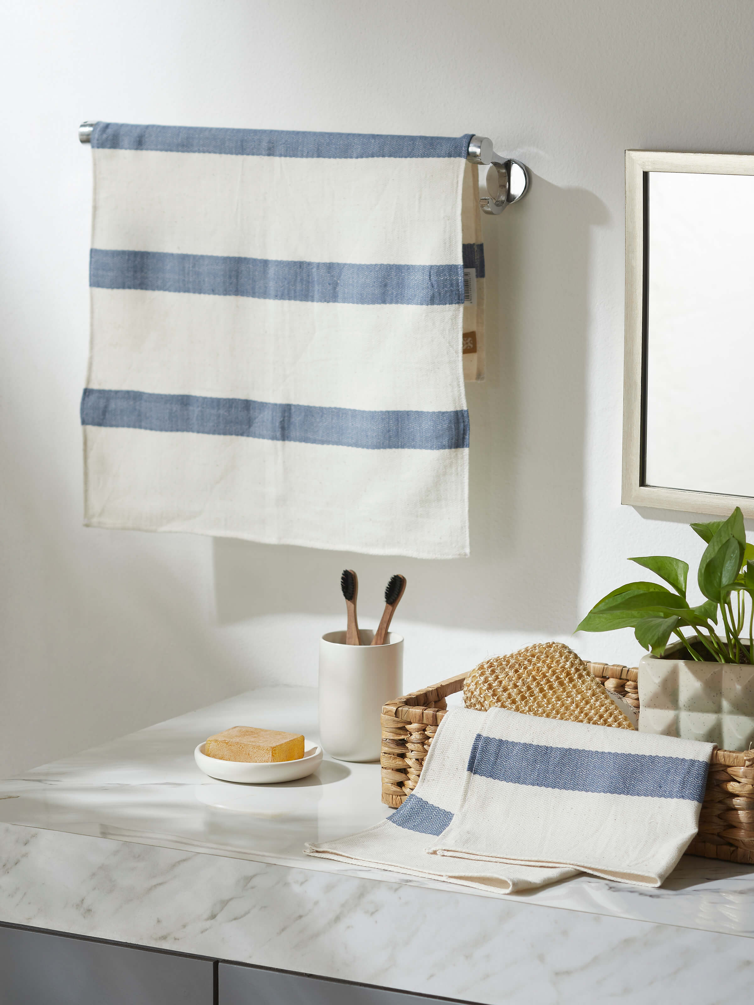 Close-up of Salya Blue Stripe Cotton Hand Towels, highlighting the fabric quality and stripe design.
