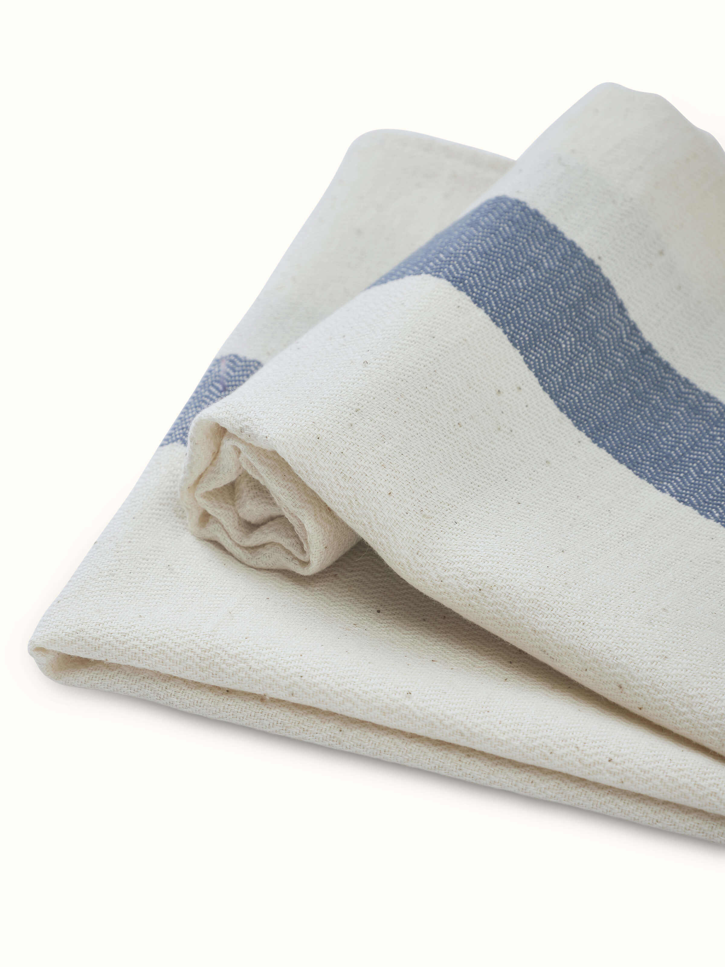 Full view of Salya Blue Stripe Cotton Hand Towels, showing their use in a bathroom setting with visible blue stripes.