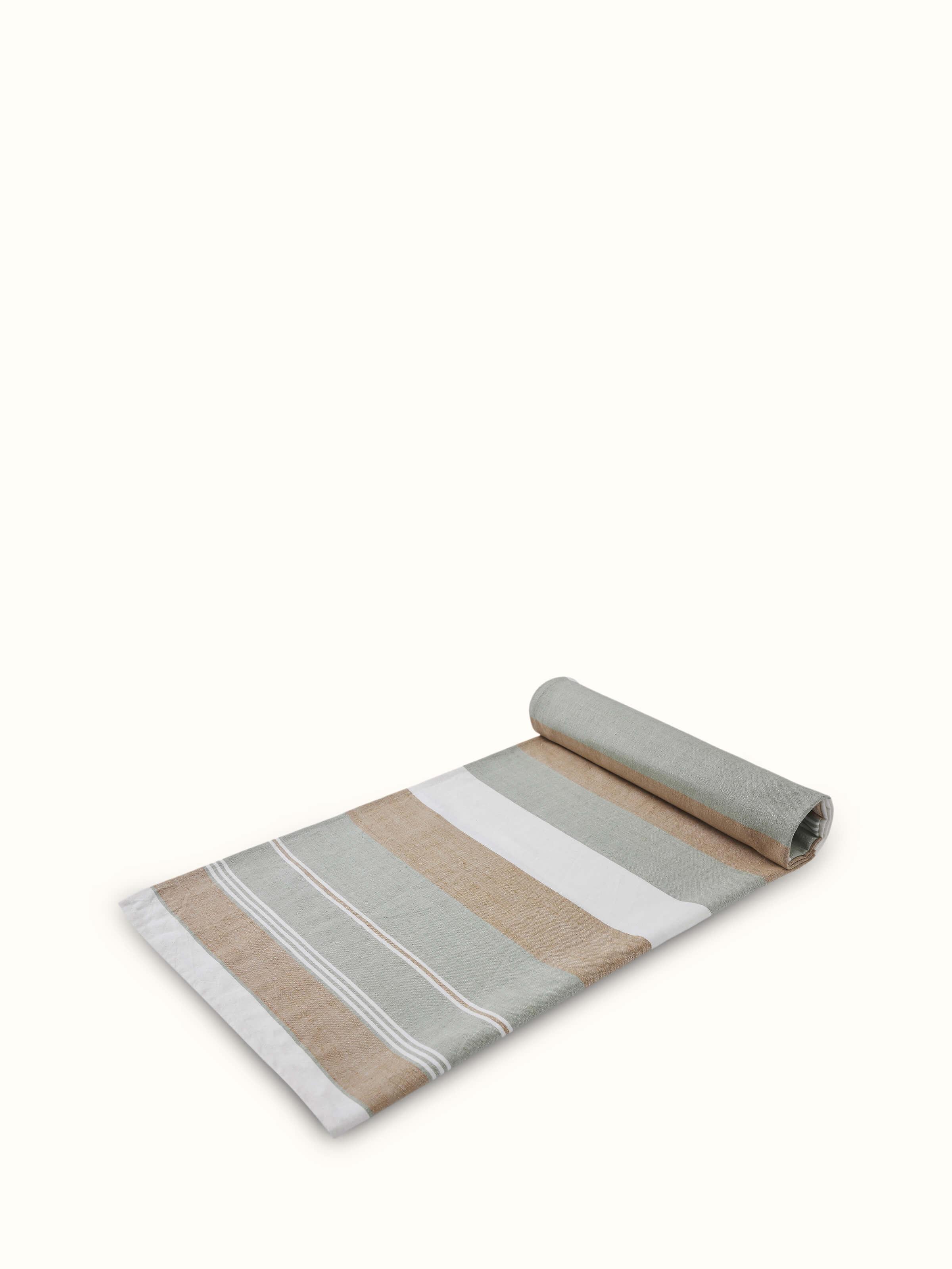 Aishani green stripe cotton bath towel, displayed to highlight the fabric and stripe pattern.