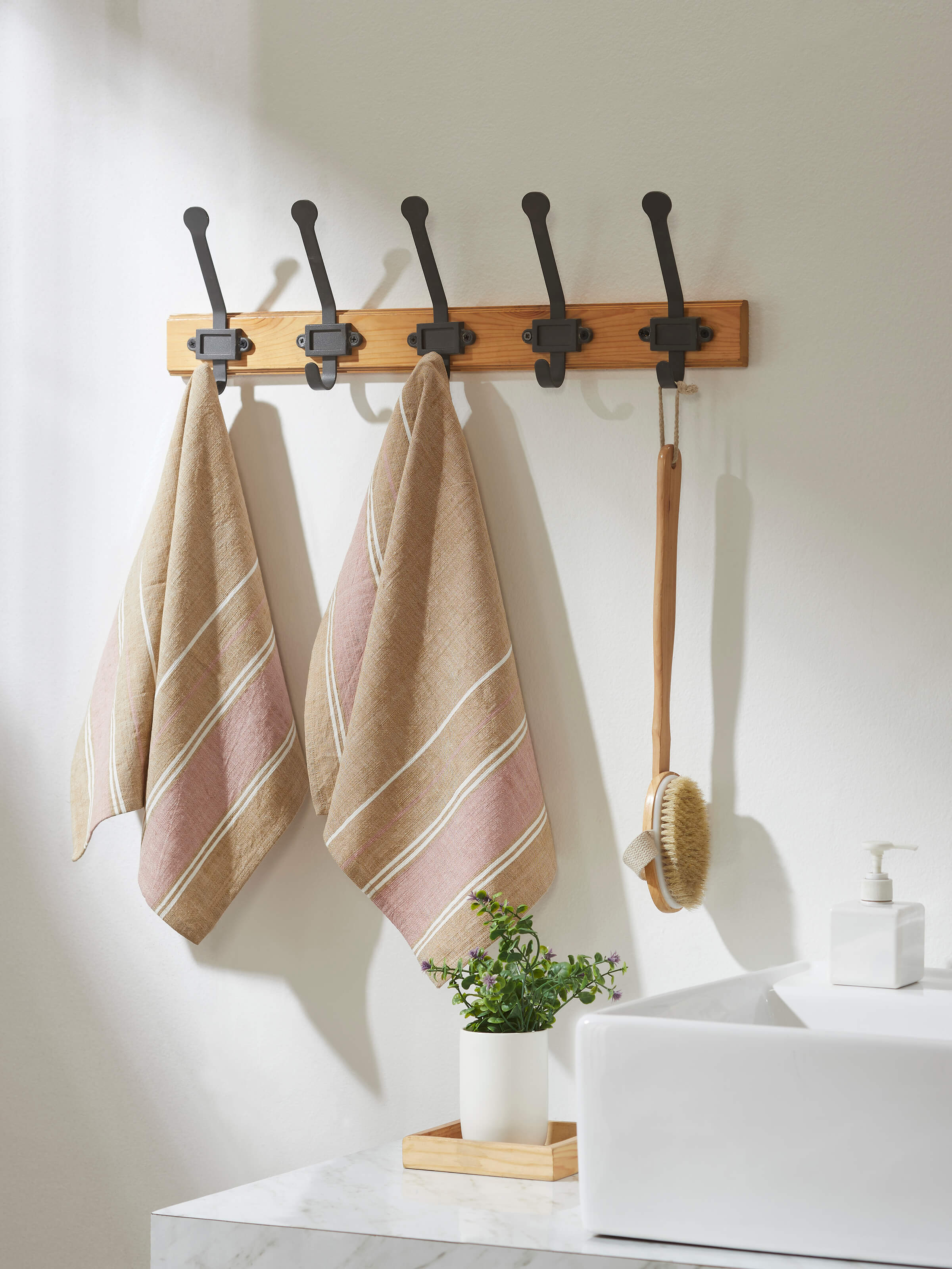 Angled view of Samistha light brown stripe cotton hand towels (2 pcs) highlighting the fabric texture