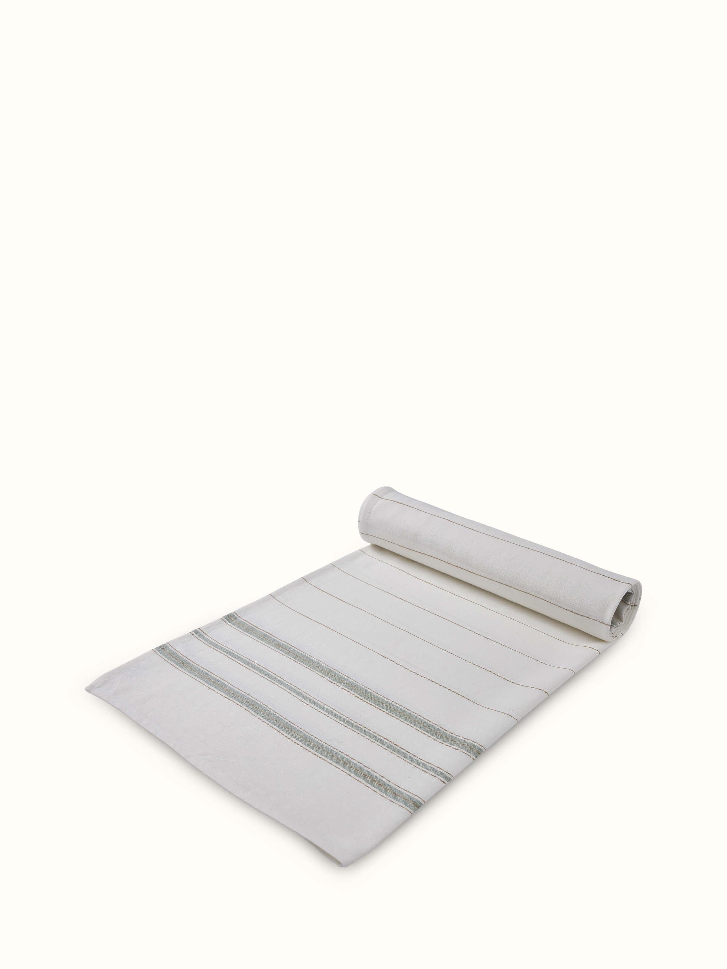 Detailed view of Adrita green cotton bath towel with visible stripes and texture