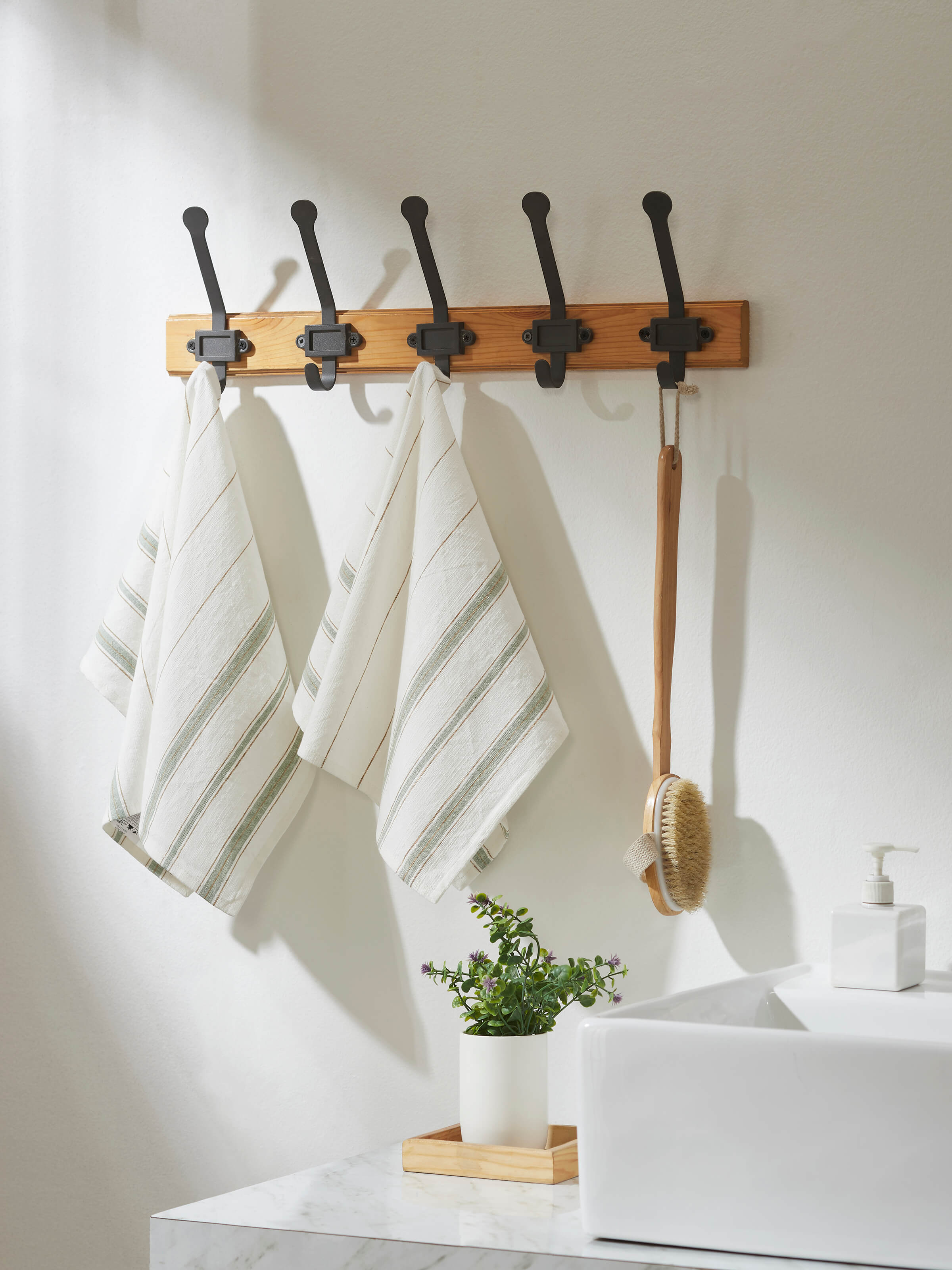 Side view of Adrita Green Stripe Cotton Hand Towels (2 pcs) highlighting the towel’s texture and stripes.