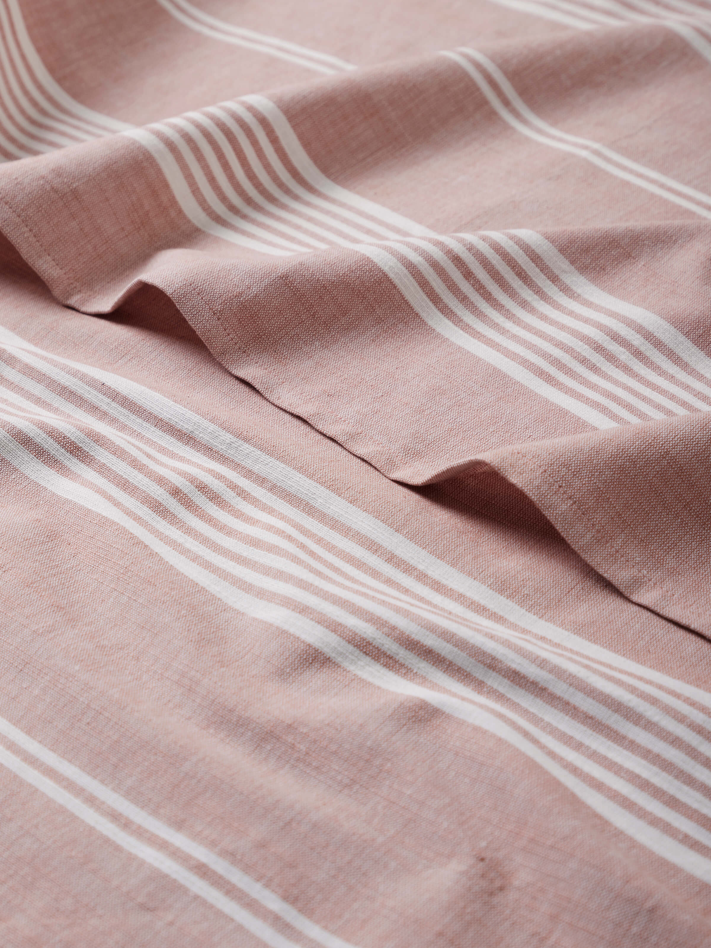 Detailed view of Simhi Pink Stripe Cotton Bath Towel (M), emphasizing the texture and stripe design.