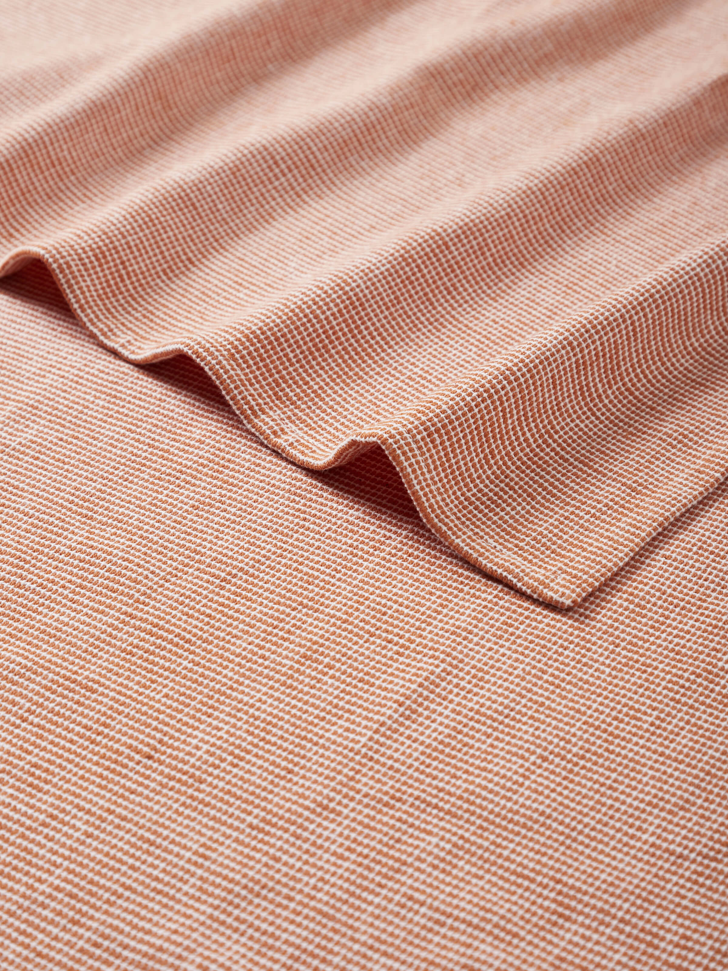 Side view of Shikara Brown Chambray Cotton Bath Towel (M), displaying the thickness and plushness of the towel.