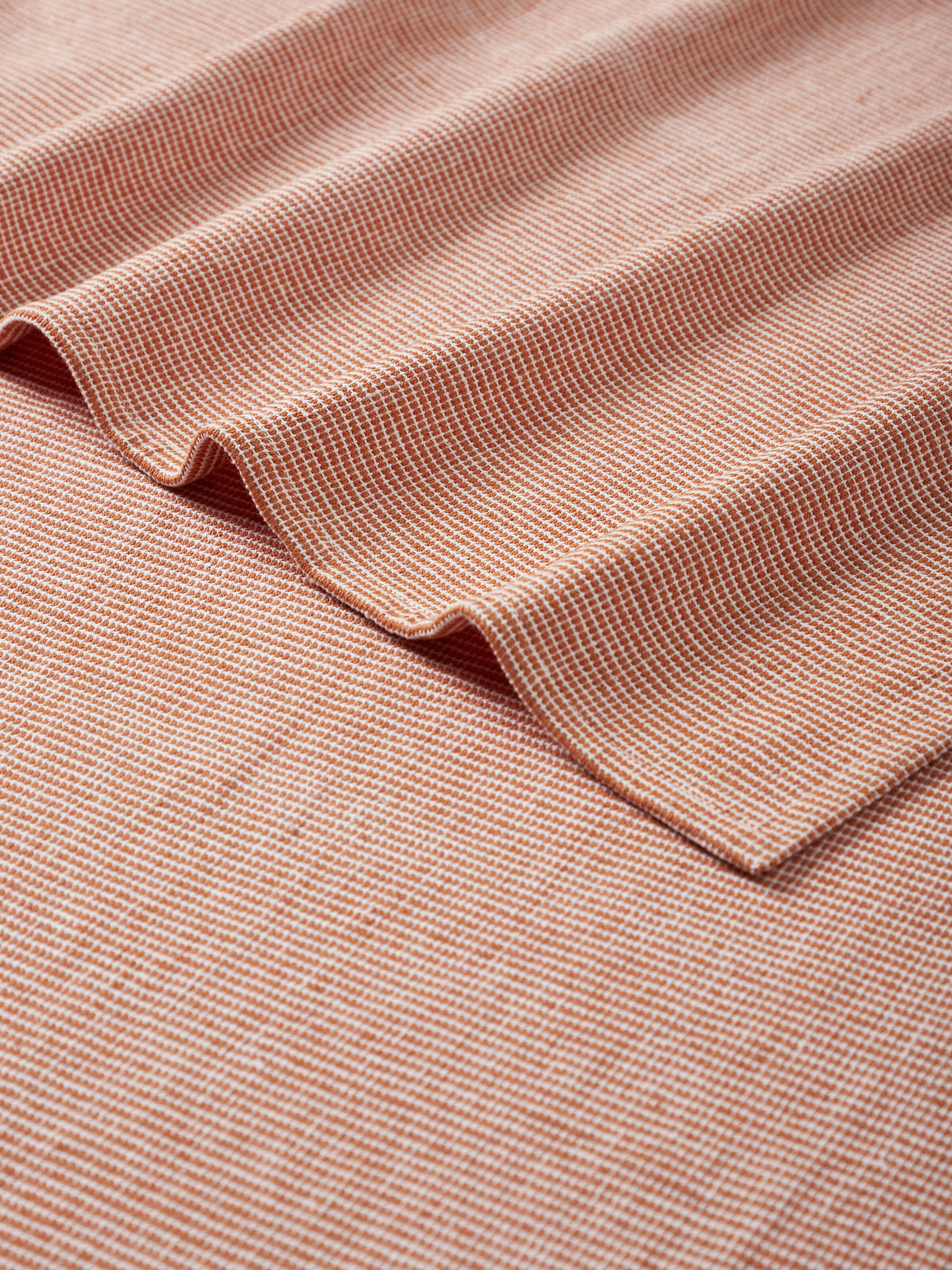 Detailed view of Shikara Brown Chambray Cotton Bath Towel (L) showing the durable stitching and quality material