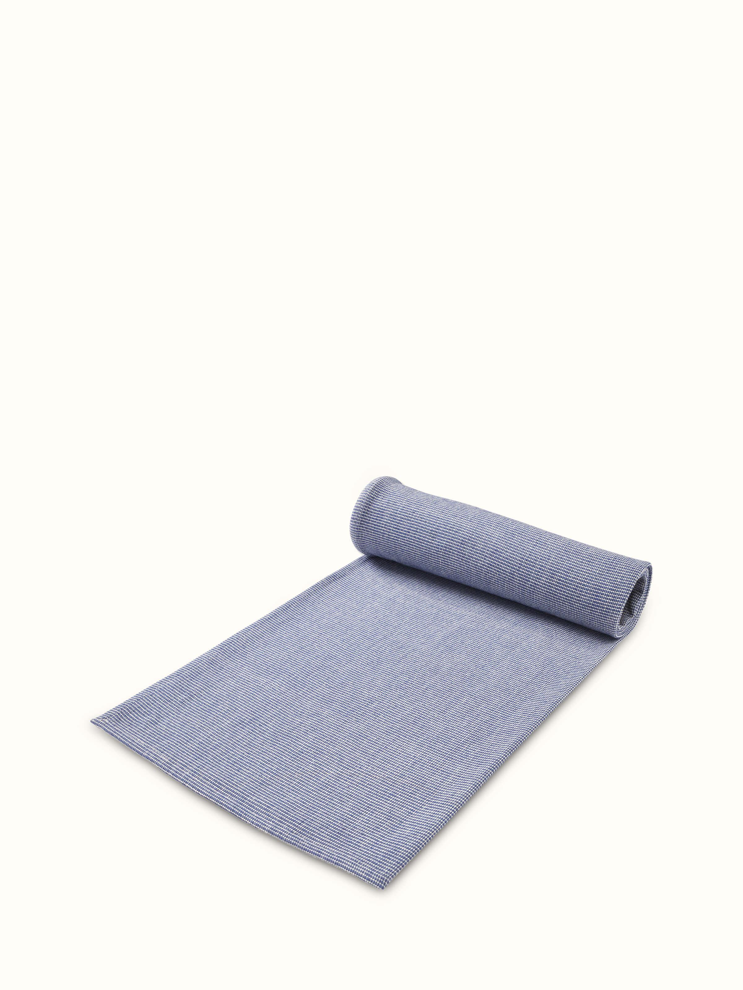 Full view of Shikara blue chambray cotton bath towel featuring its elegant blue chambray color and generous size