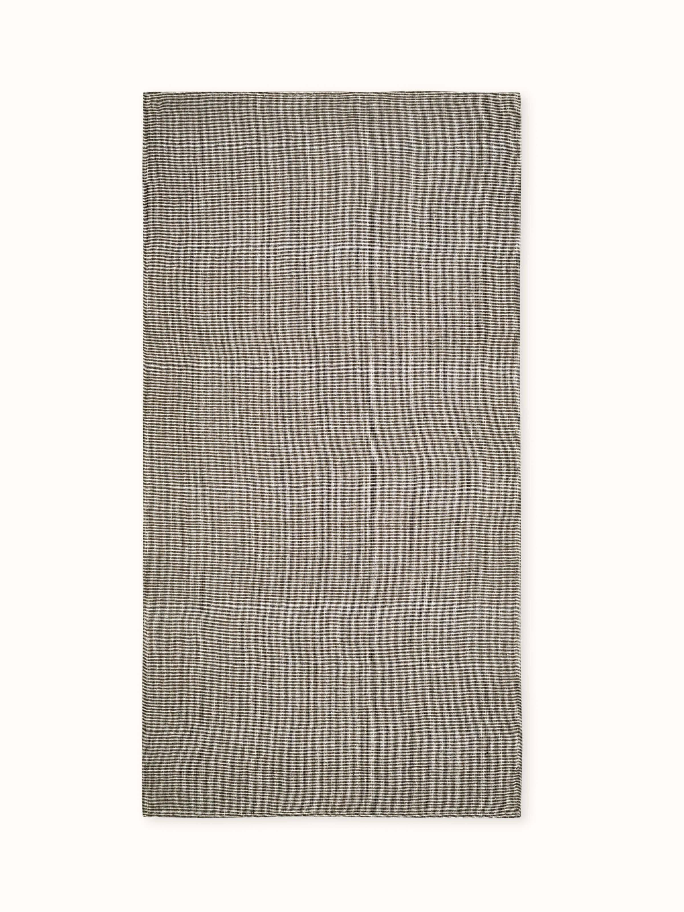 Full view of Shikara green chambray cotton bath towel (L) showing its green chambray fabric and large size