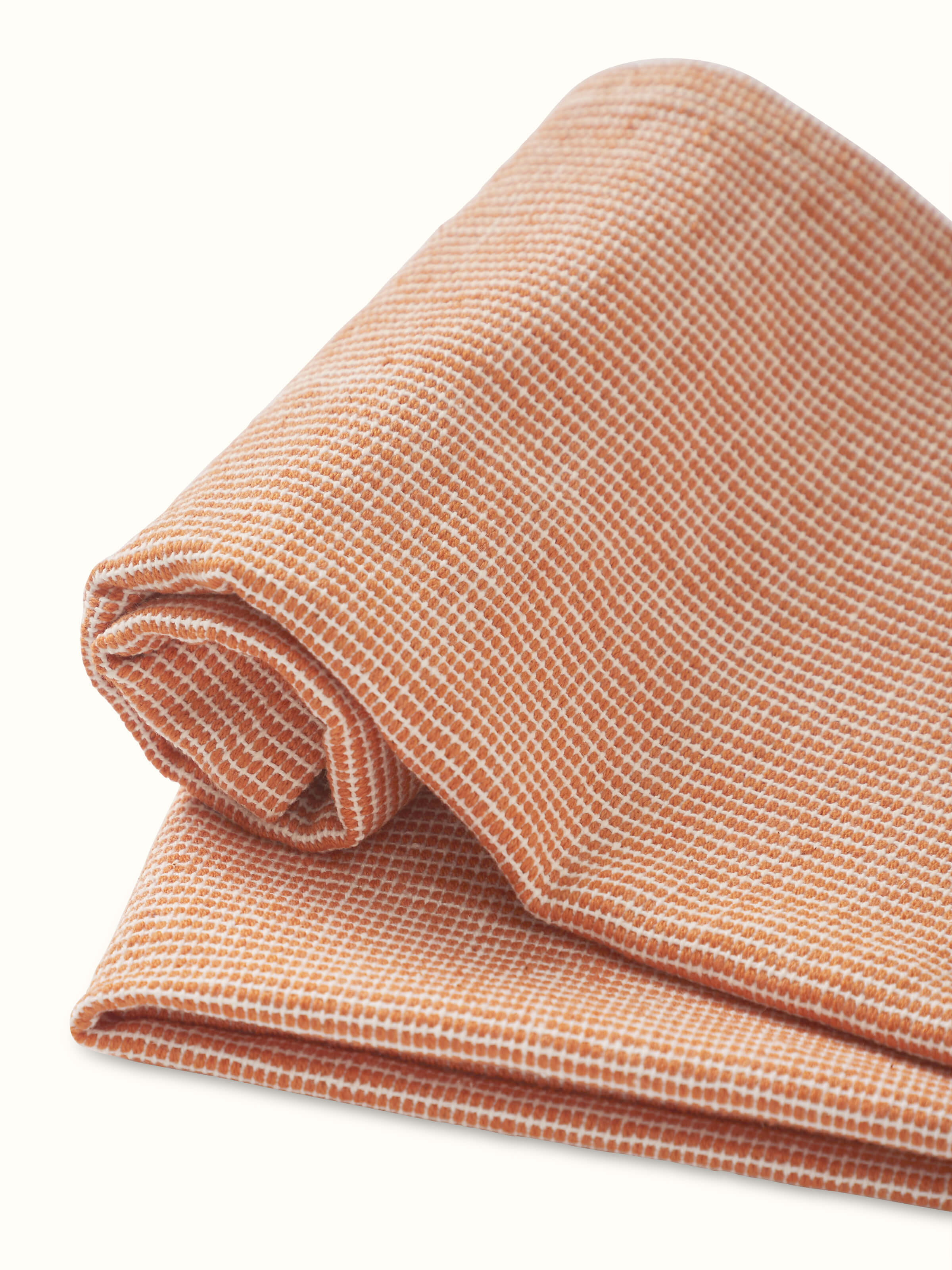 Full view of Shikara rust chambray cotton hand towels (2 pcs) featuring the rich rust color and chambray texture.